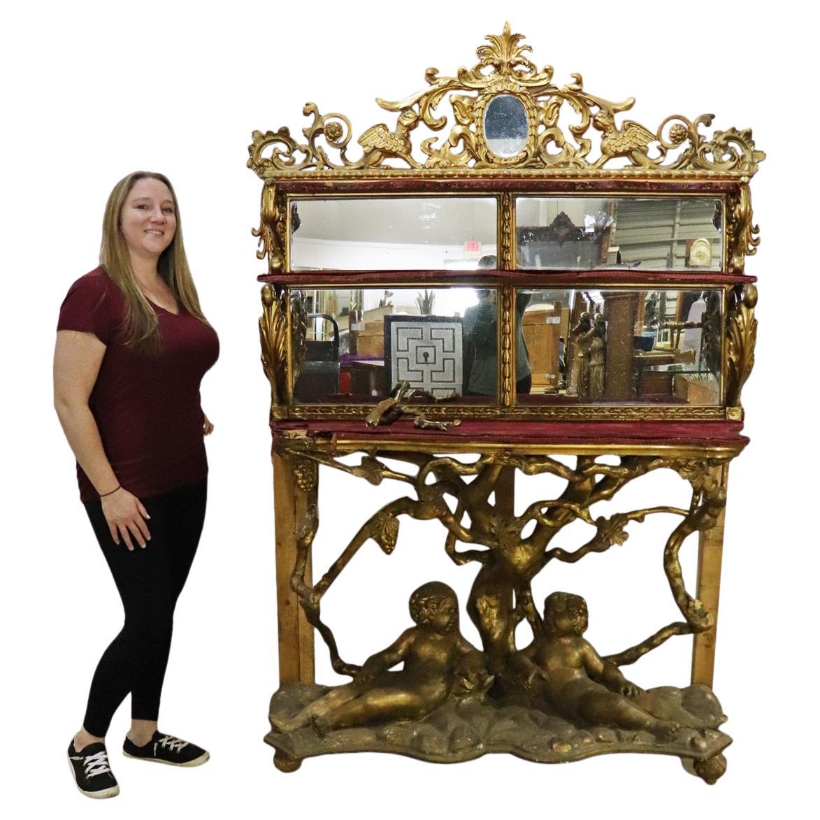 Gilded Palatial Mirrored Console Cabinet Vitrine with Putti For Sale