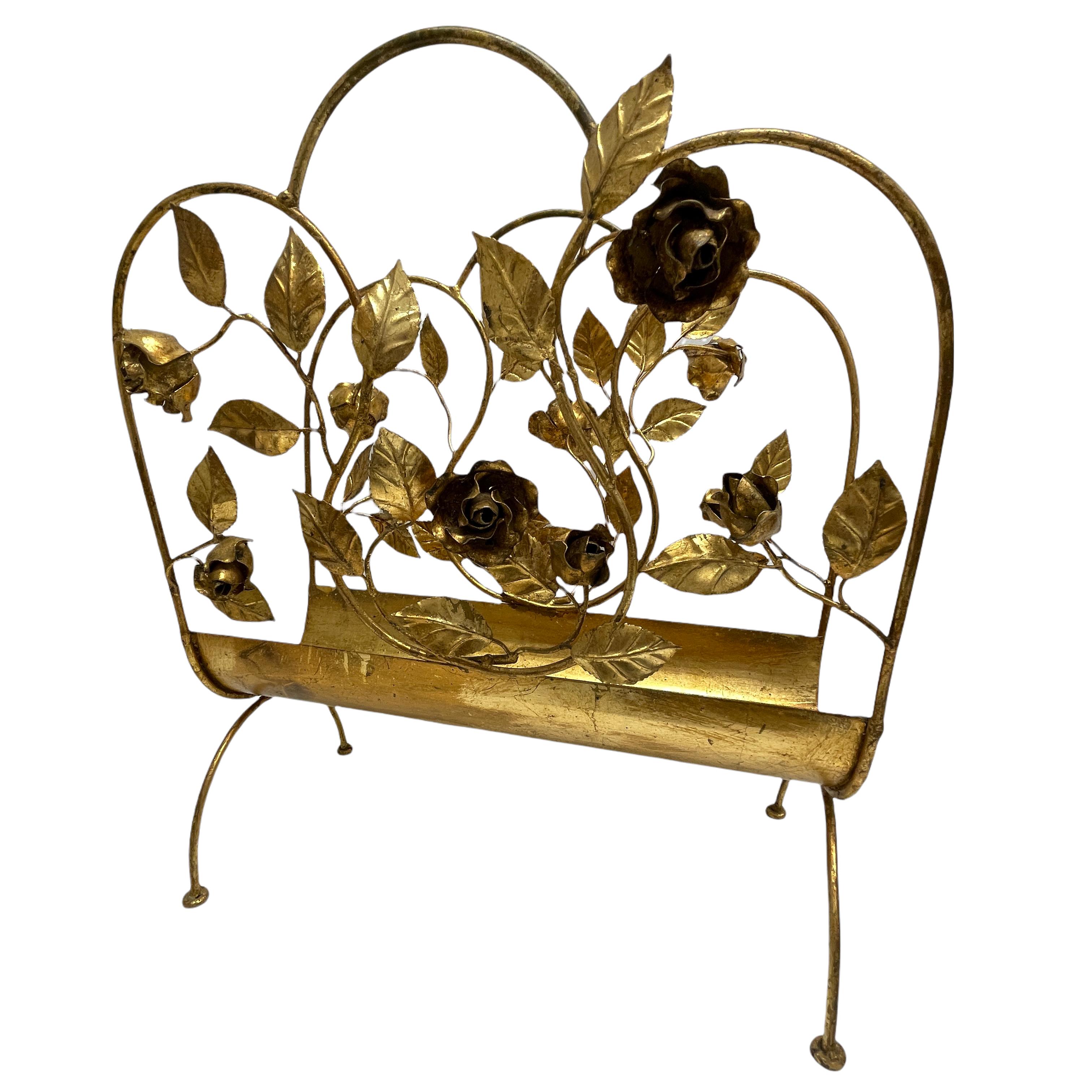 Beautiful Florentine Italian gilded magazine rack. Perfect as a storage stand near your reading chair. The piece is in beautiful antique condition with patina. There is slight paint and gilding loss commensurate with its age. The patina only adds to