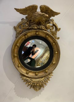 Gilded sculpted wood eagle convex mirror - c.19th century