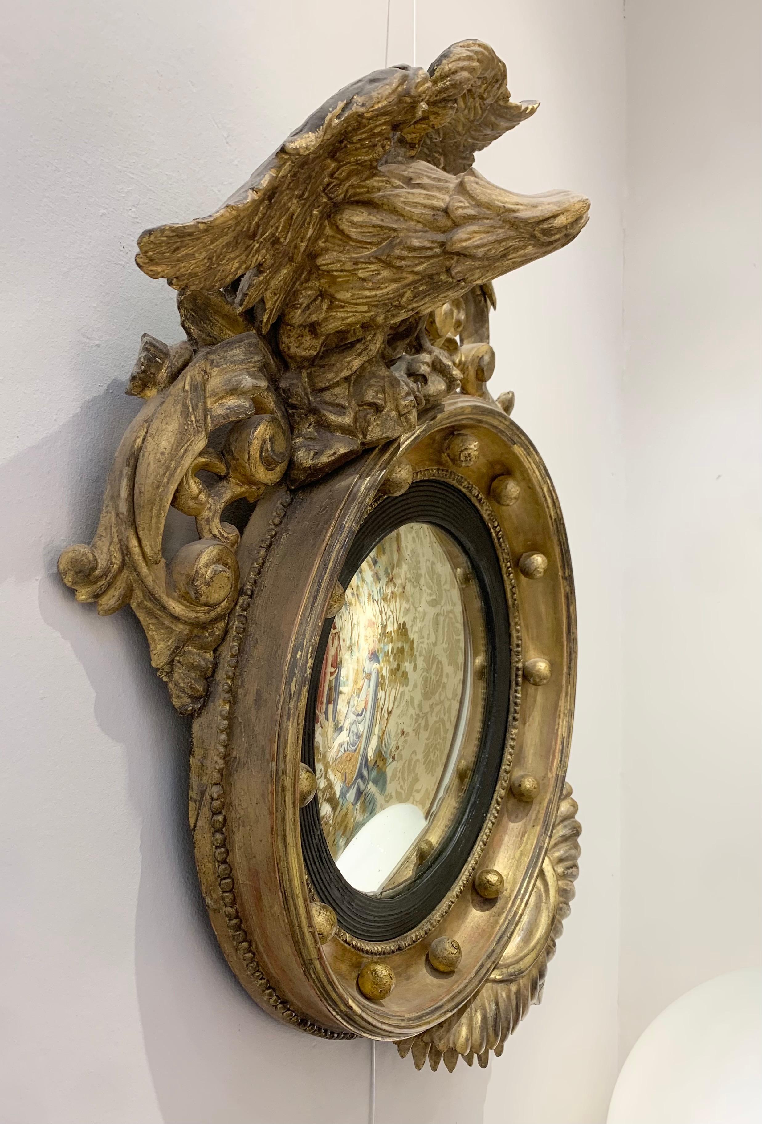 19th Century Gilded sculpted wood eagle convex mirror - c.19th century