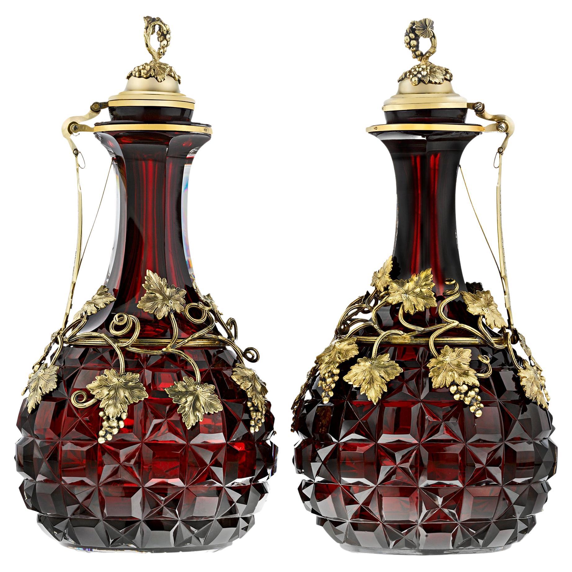 Gilded Silver and Cranberry Glass Decanters