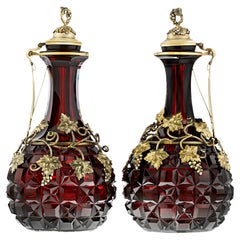 Gilded Silver and Cranberry Glass Decanters