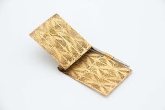 Gilded silver block holder in filigree mesh