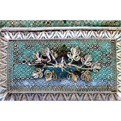 Gilded silver filigree box with floral applications and hinged lid