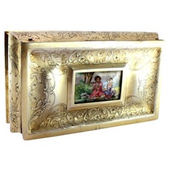 Gilded silver jewelry box with plant engravings and enamel gallant scene