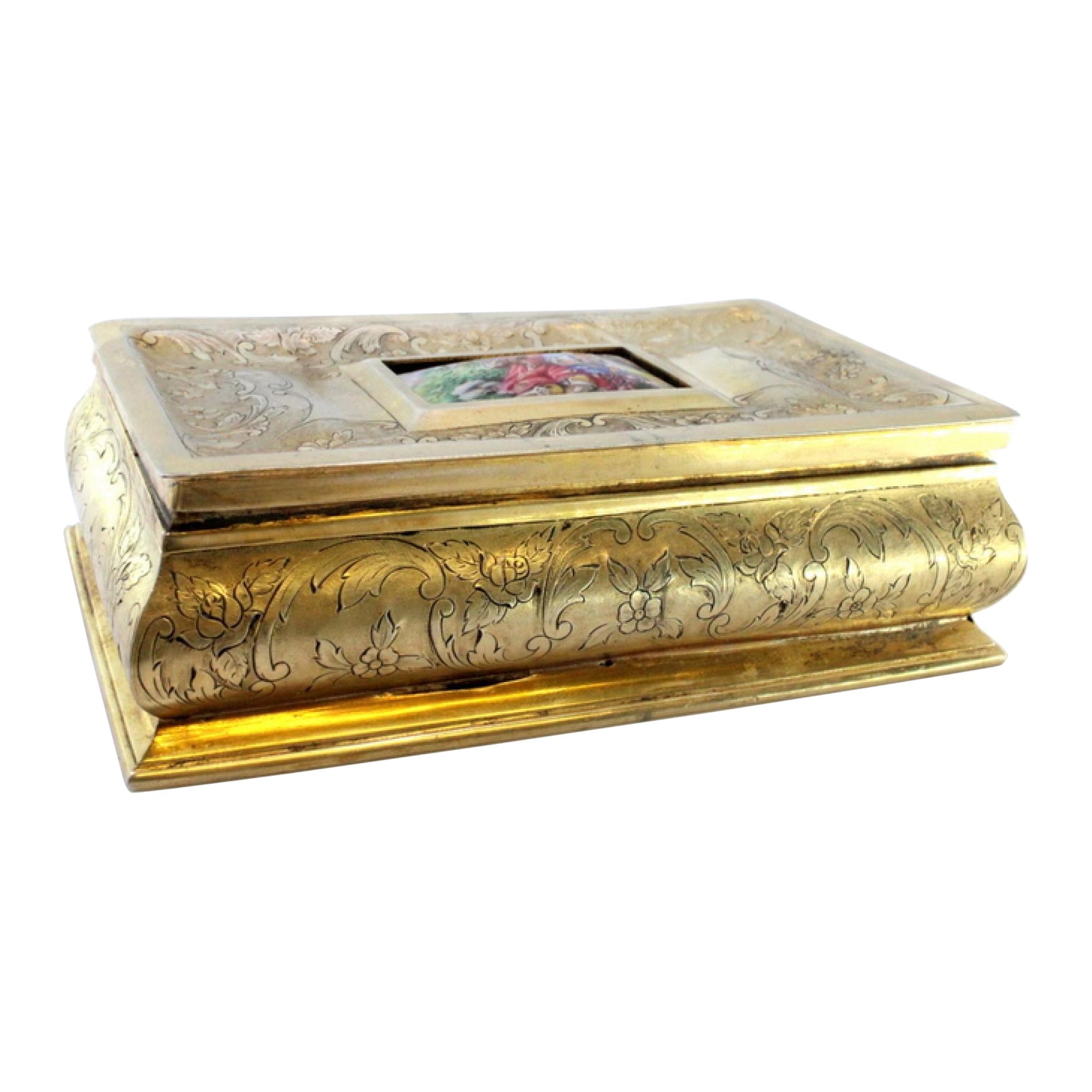 Gilded silver jewelry box with plant engravings and enamel gallant scene