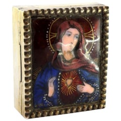 Gilded silver pin box with enamel Saint figure and pearly frieze