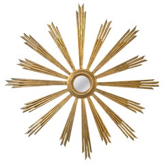 Specchio dorato a raggiera circa 1940 Italia Specchio dorato a raggiera circa 1940 Italia