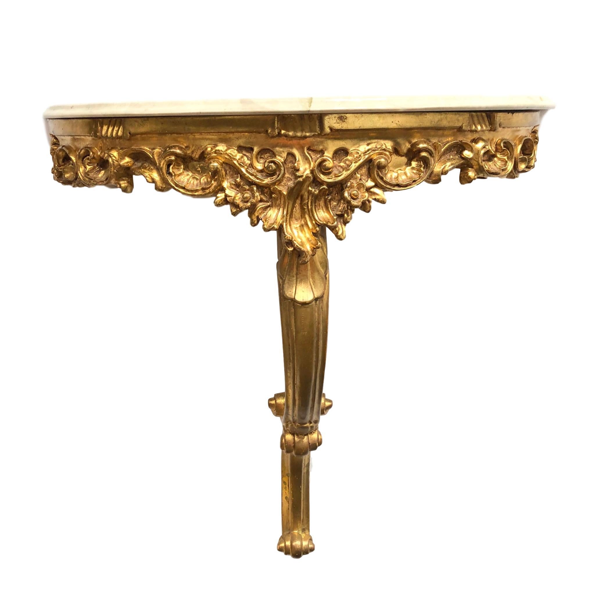 Beautiful gilded tole wooden wall shelf Hollywood Regency style with marble plate, vintage, Italy, 1960s. Nice addition to any room or hall entry.