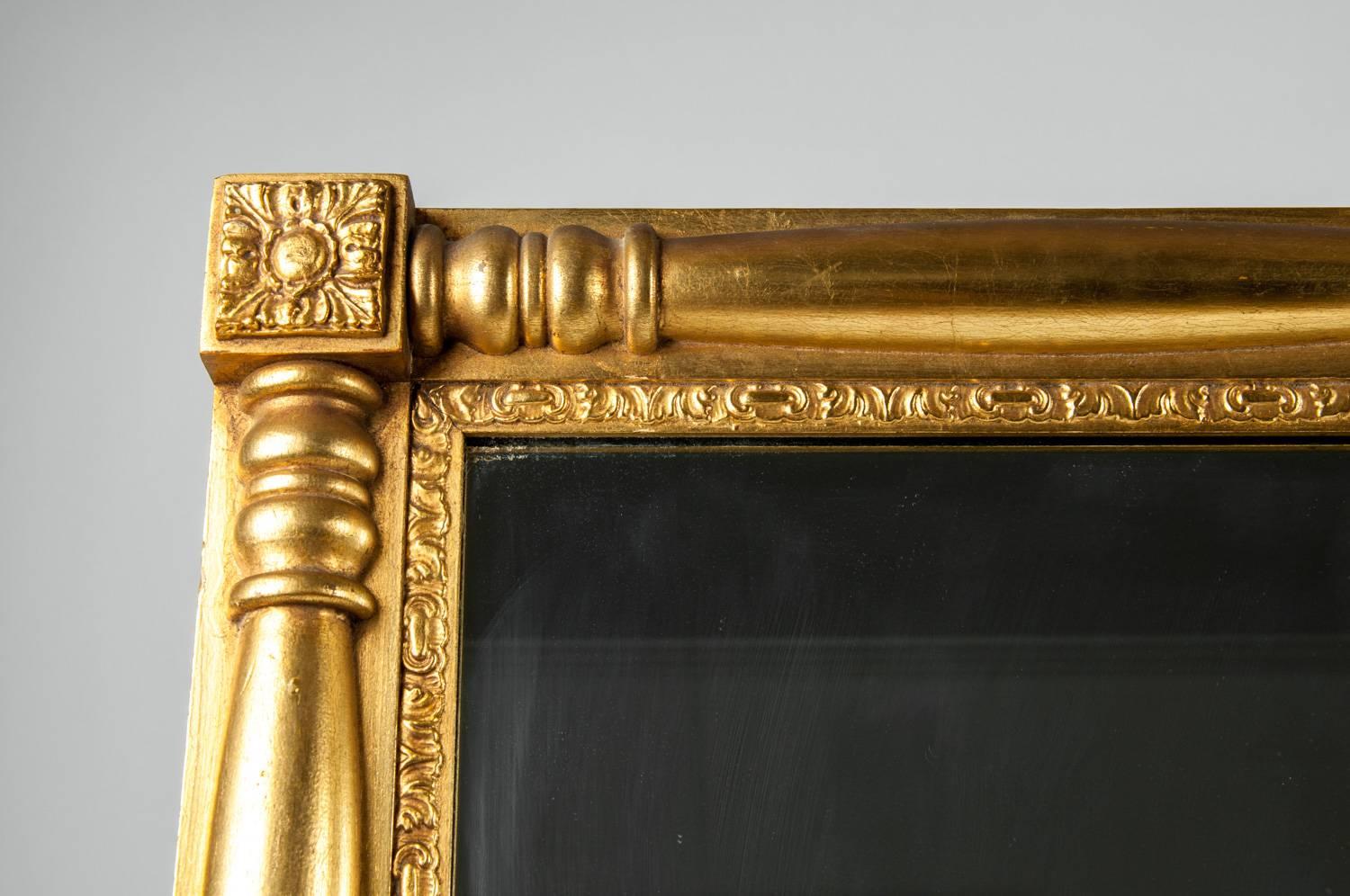 Vintage European gilded wood framed mantel or fireplace hanging wall mirror. The mirror is in excellent vintage condition with some minor wear consistent to use / age. The mirror measure about 45 inches x 35 inches x 2 inches.