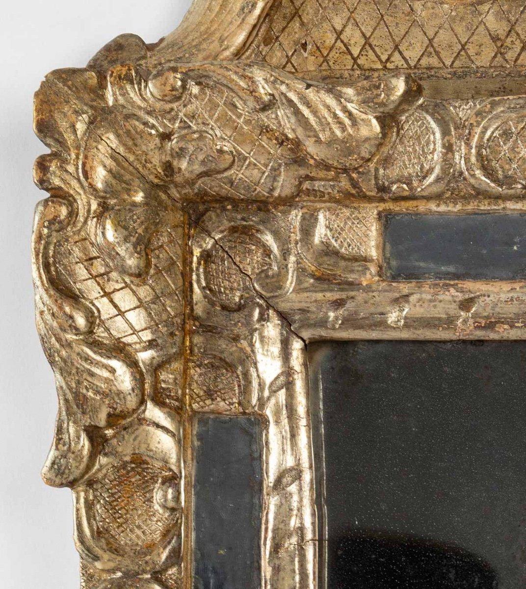 Gilded wood mirror with silver leaf, antique mercury glass and glazing
Louis XIV period, 18th century
Dimensions: Height: 57cm x width: 35cm x depth: 4cm.