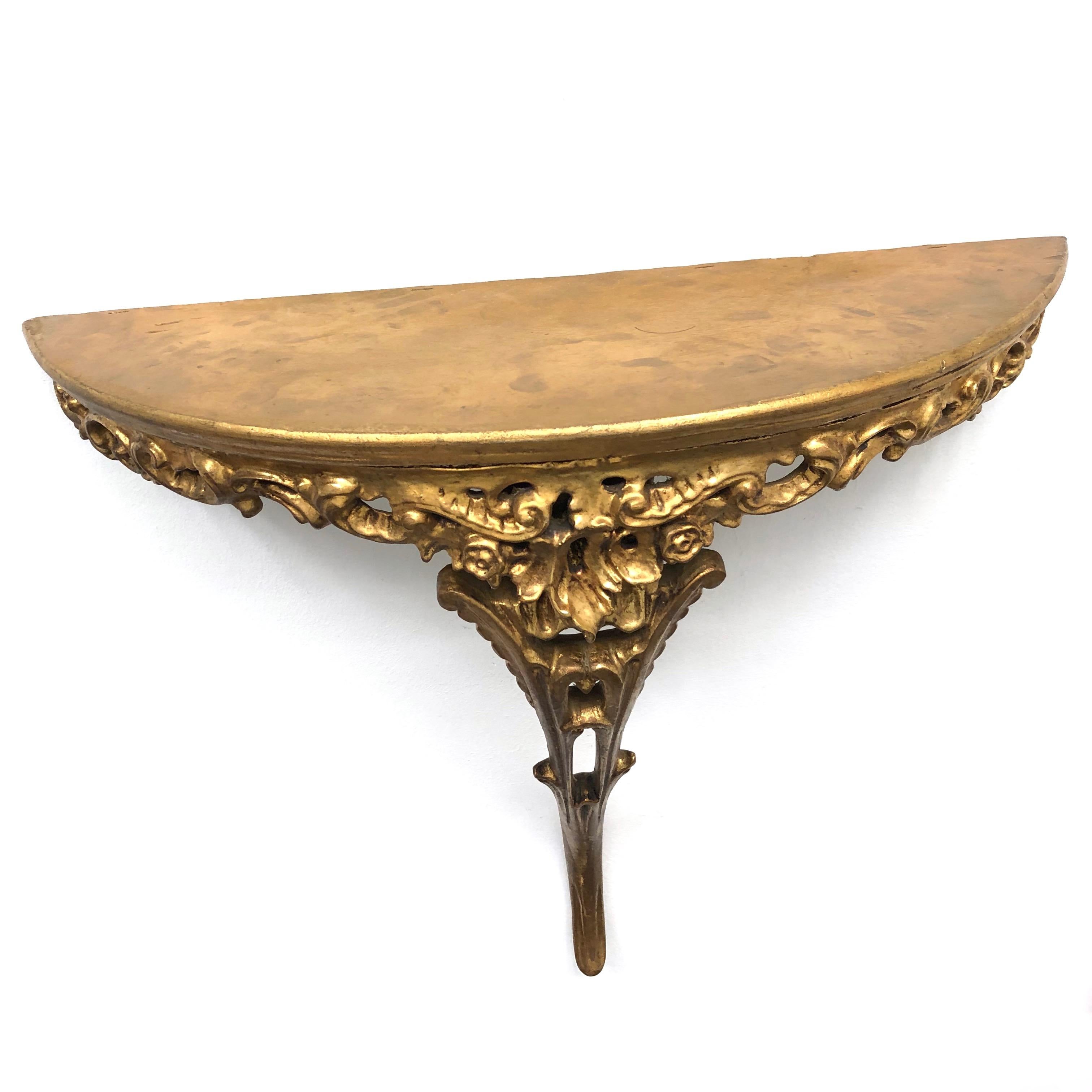 Beautiful gilded tole wall shelf Hollywood Regency style, vintage Italy, 1960s. Nice addition to any room or hall entry.