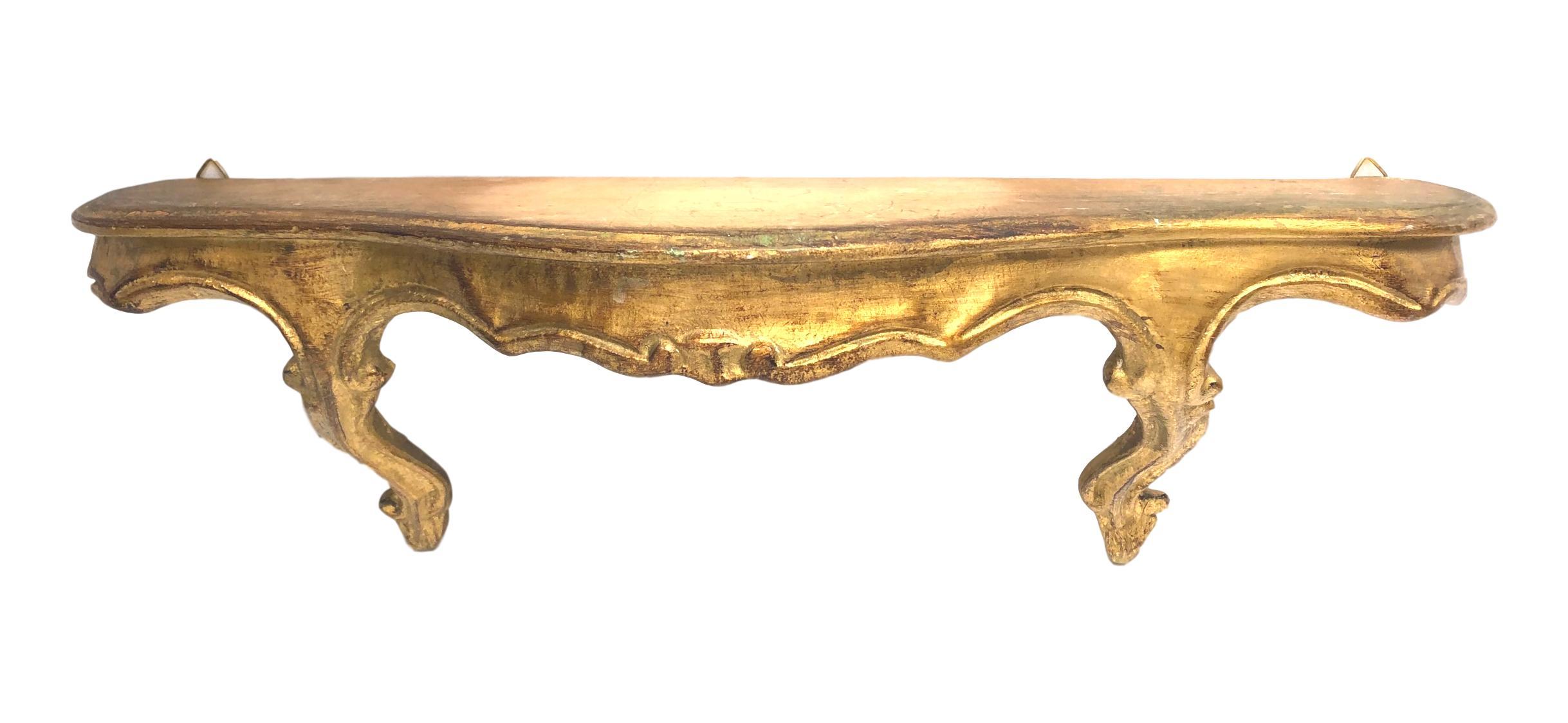 Beautiful petite gilded tole wall shelf Hollywood Regency style, vintage Italy, 1960s. Nice addition to any room or hall entry.