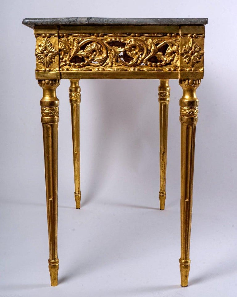 Gilded wooden console table with leaf.
Louis XVI - 18th century
Dimensions without marble: Height: 82,5cm x width: 88cm x depth: 51cm
Marble dimensions: Length: 93cm x width: 54,5cm - Thickness: 2,5cm.