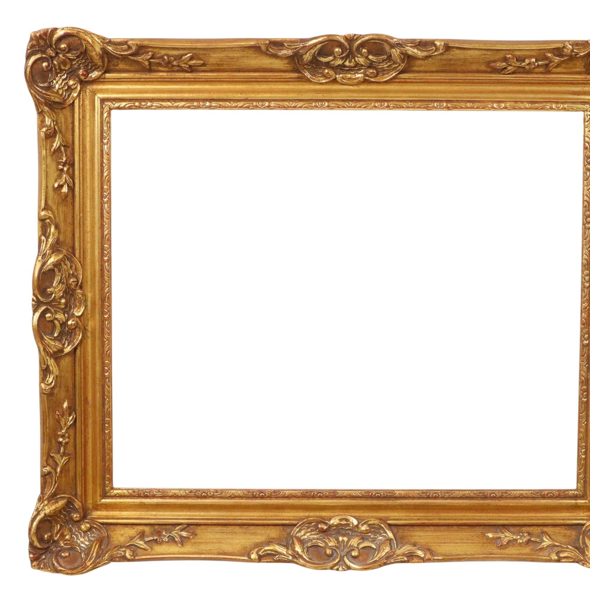 Beautiful gilded classic frame, entirely in the typical Baroque style, elegantly decorated with acanthus leaves, vines, flowers, and ribbon patterns. Made of pine and plaster, circa the mid-20th century.

This fantastic Baroque frame has stood the