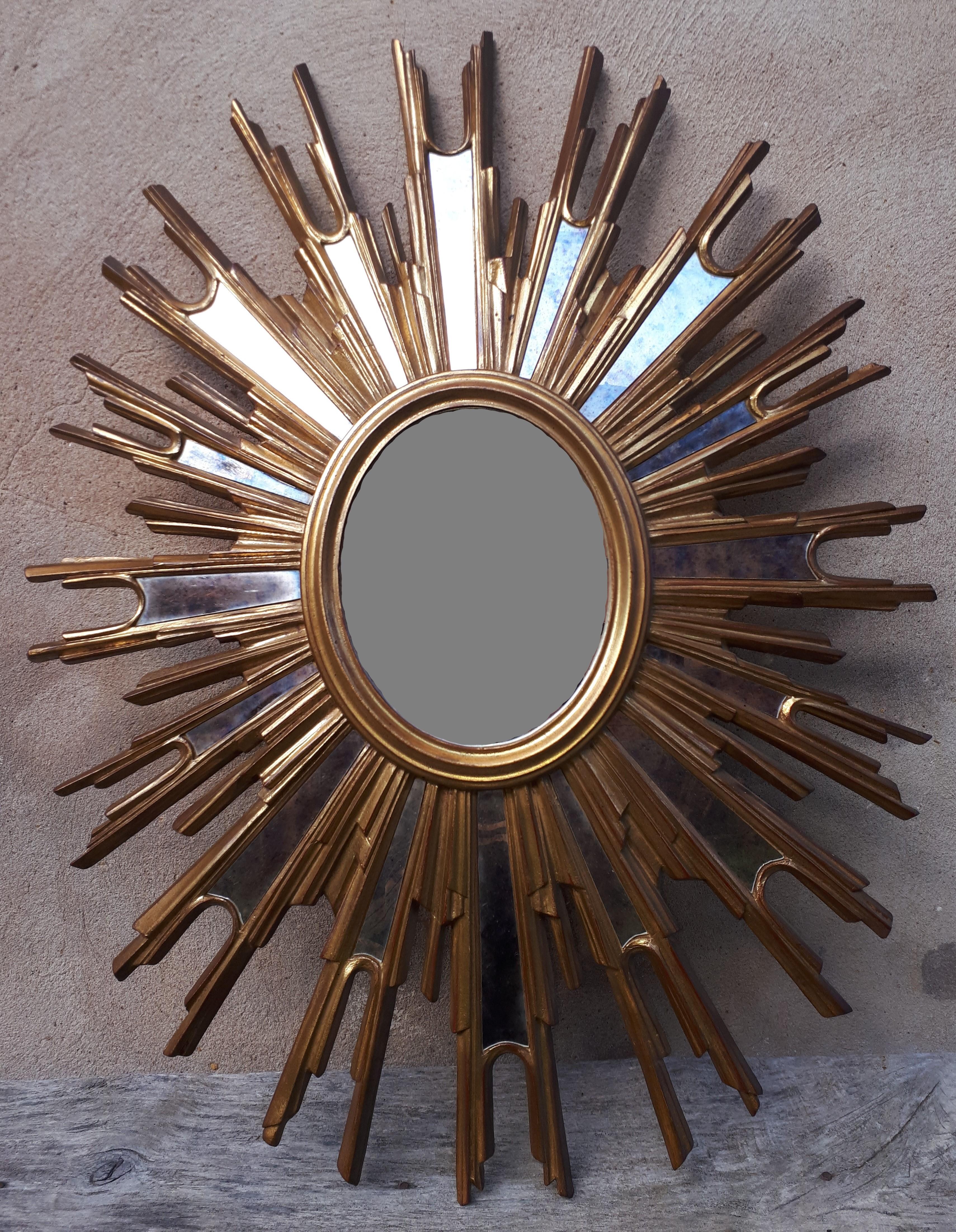 French Gilded wooden witch or sunburst mirror, France 1950 For Sale