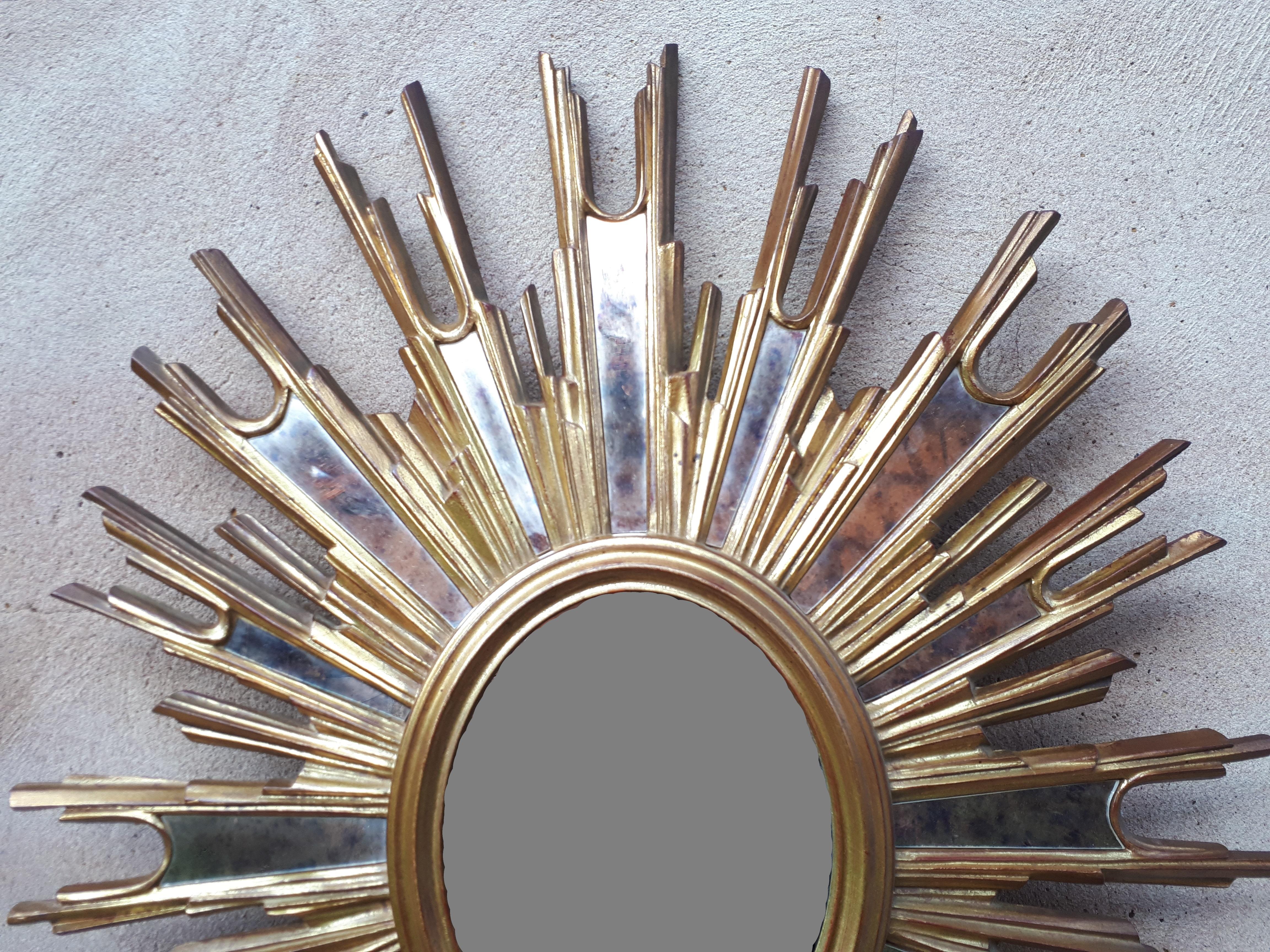Gilded wooden witch or sunburst mirror, France 1950 For Sale 2