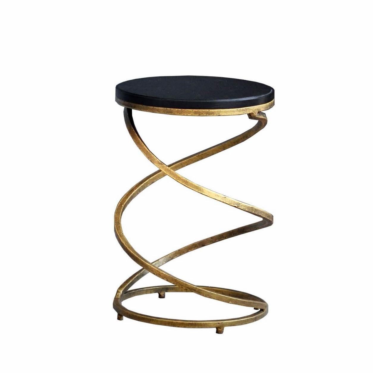 Pair of side tables consisting of a graphic and geometric hammered wrought iron metal feet with a round black wooden tray.