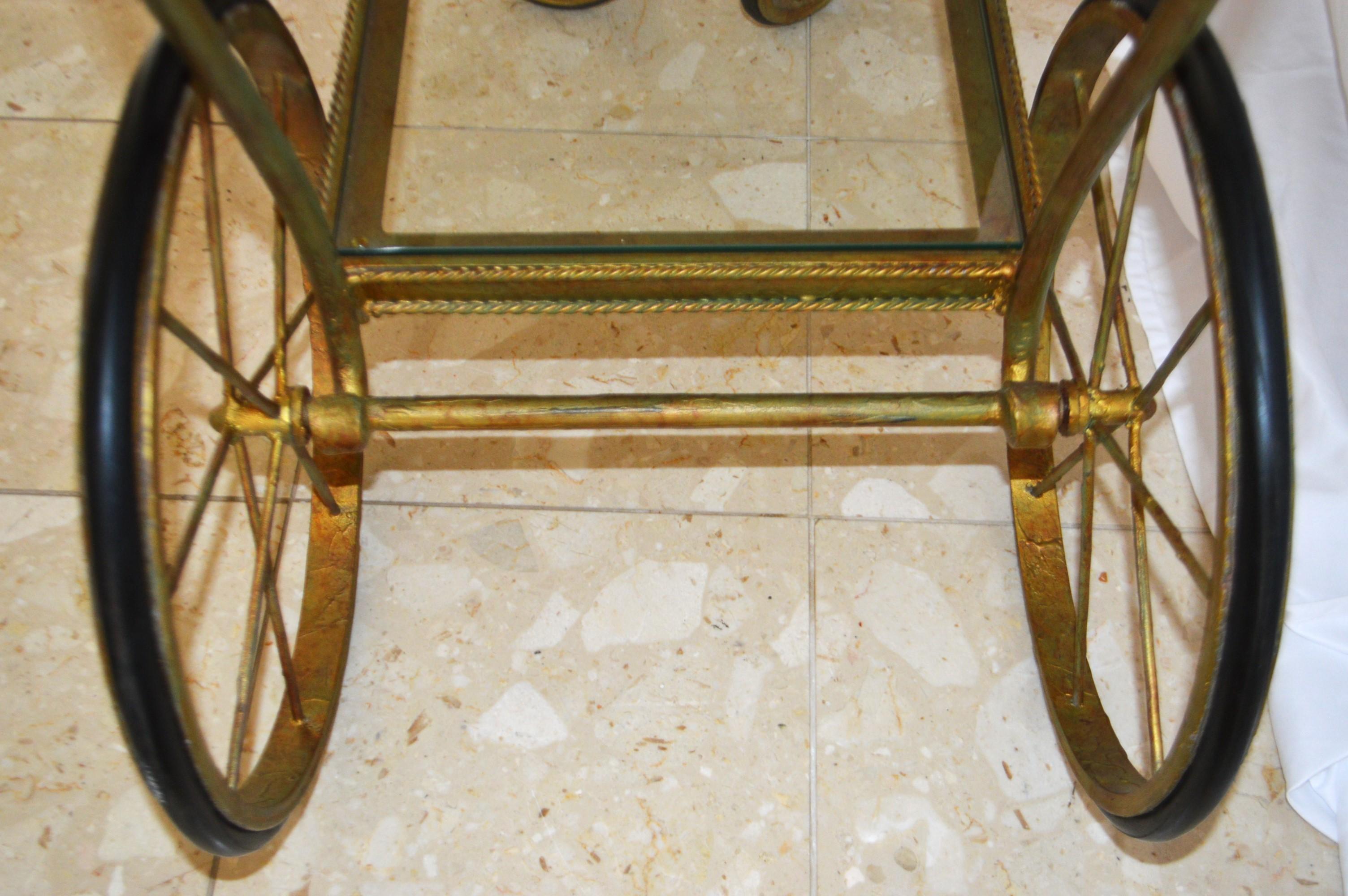 French Gilded Wrought Iron Bar Cart on wheels with two levels with glass tops.