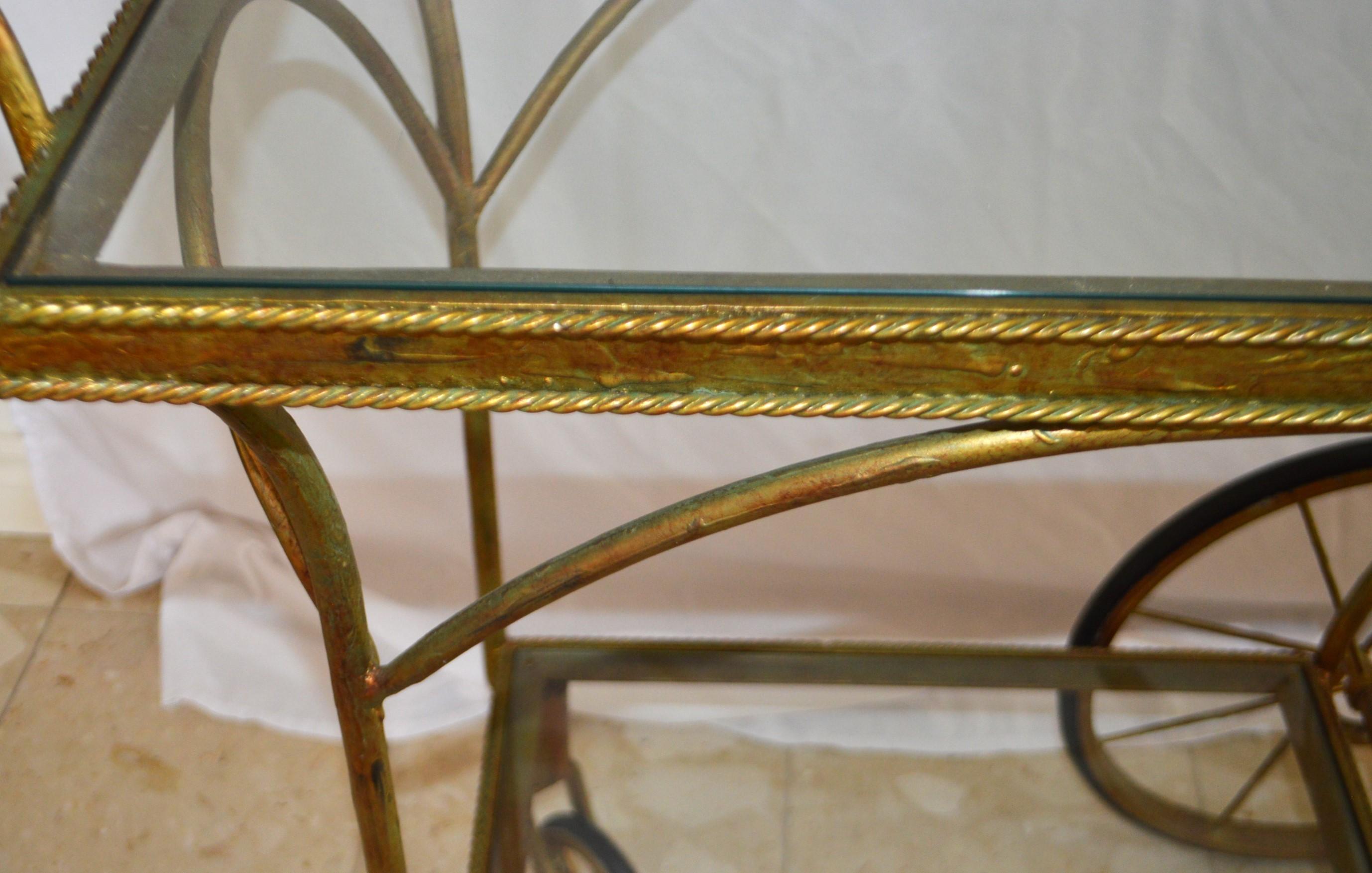 Gilt Gilded Wrought Iron Bar Cart on wheels with two levels with glass tops.