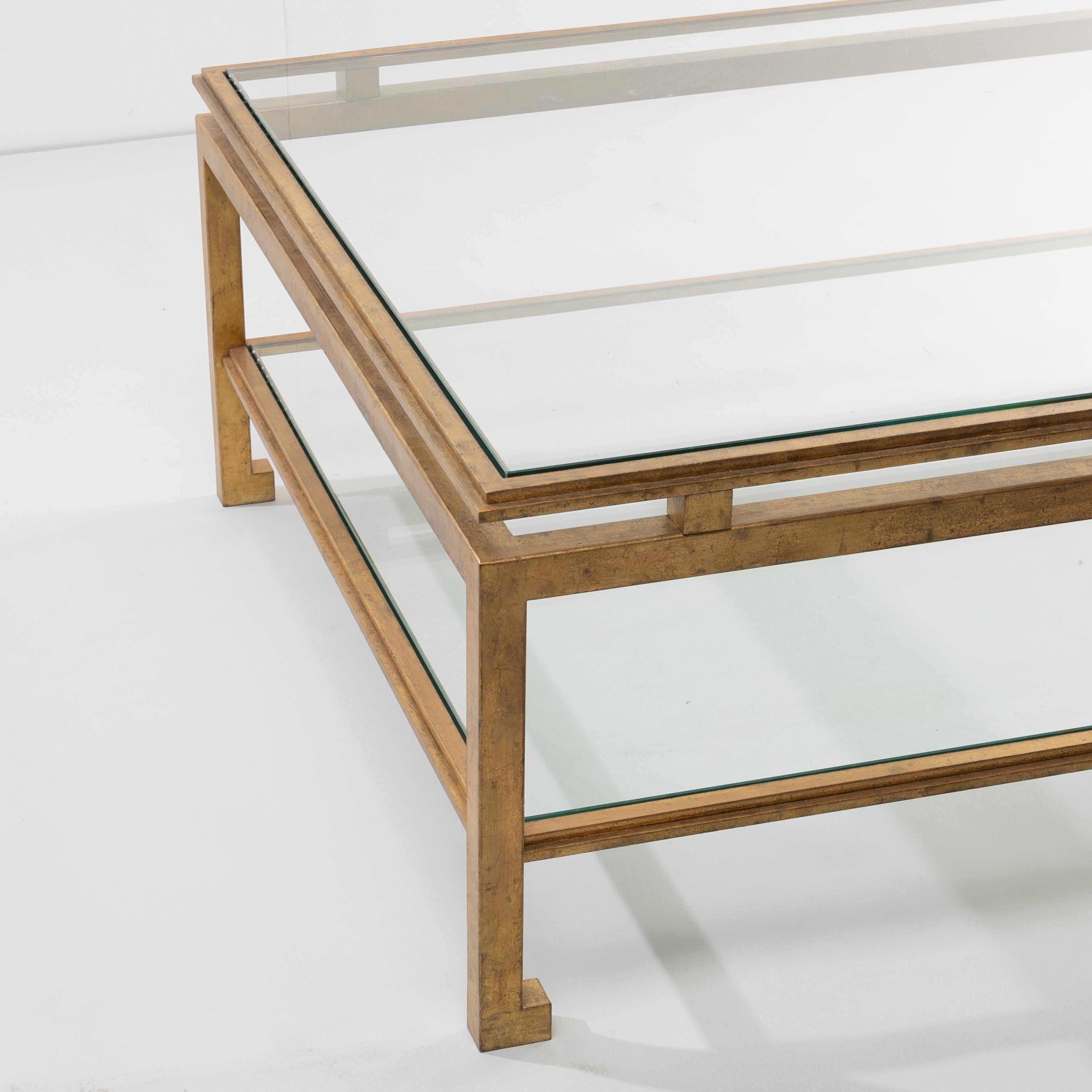 Verre Table basse en fer forgé doré par Maison Ramsay en vente