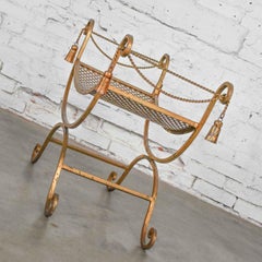 Sgabello per vanità in ferro battuto dorato Curule o Savonarola Hollywood Regency italiano