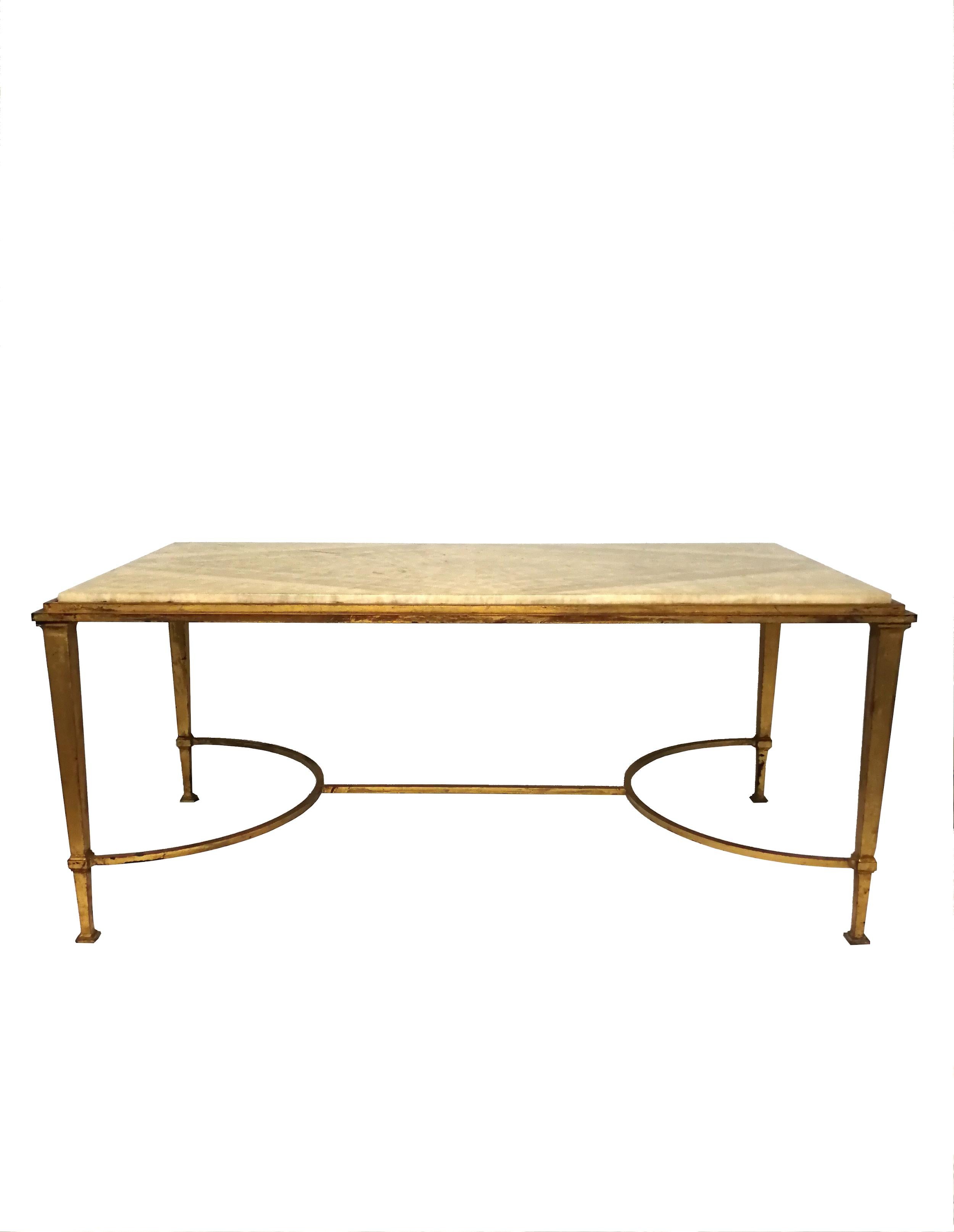 Superb coffee table designed by Maison Ramsay with gold leaf patinated beaten iron structure and rectangular light green onyx 