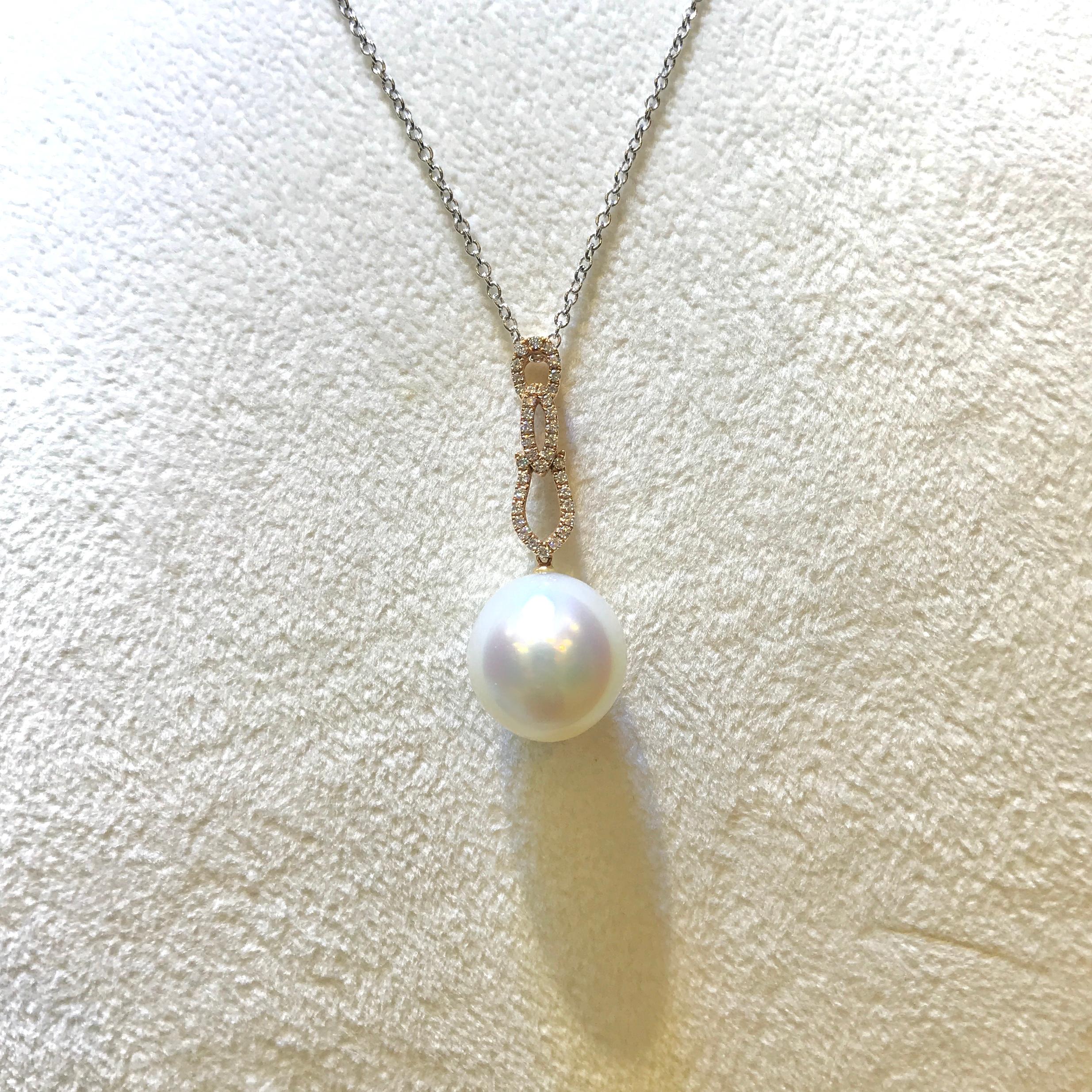 Simple and elegant Pink gold white south sea pearl diamond pendant, the pearl is pinkish overtone, sweet and tender. Natural blemishes on the pearl.

Height: 34.04 mm / Width: 5.54 mm / Depth: 2.57 mm / Southsea Pearl : 14.1 mm  x 14.8 mm
18 Karat