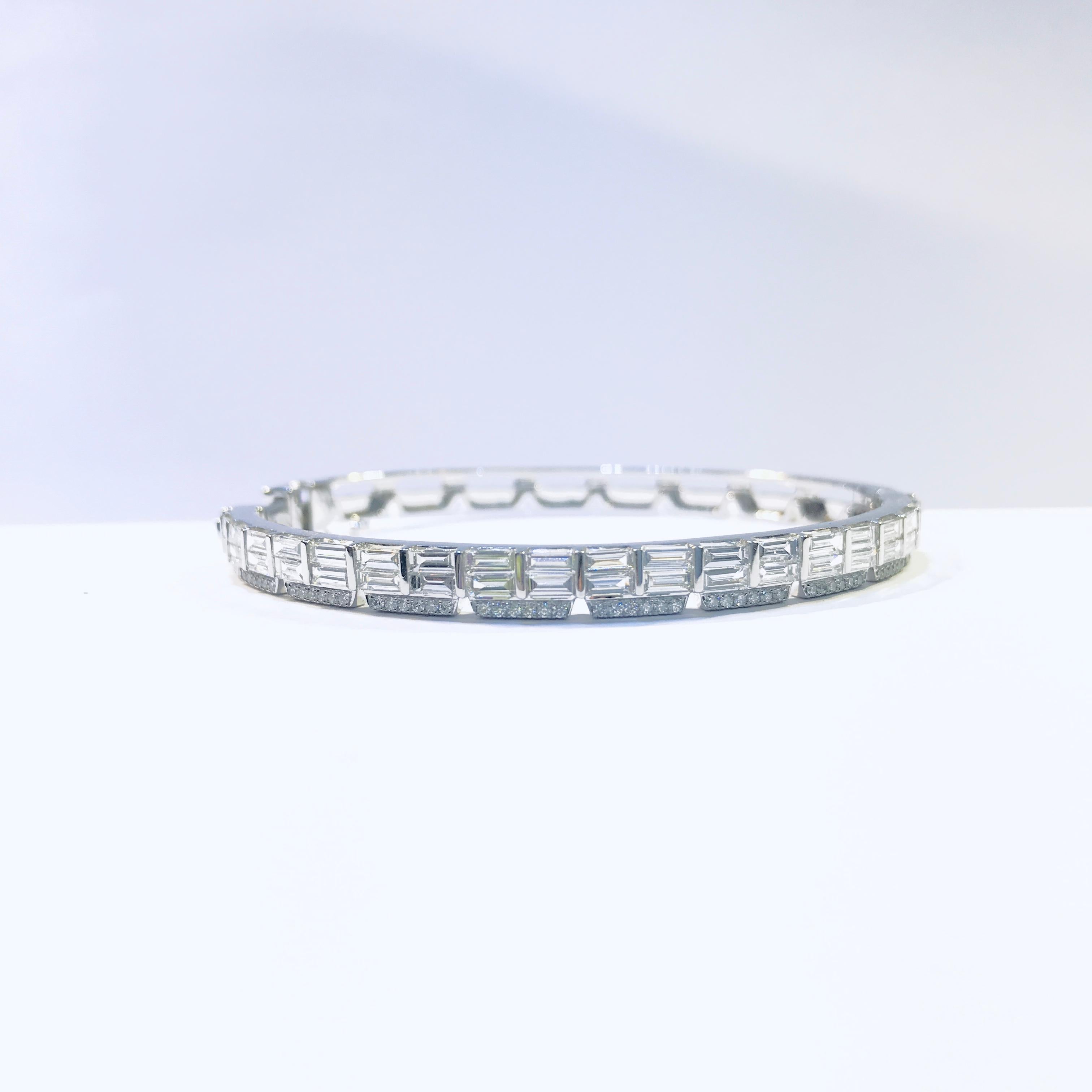 Bricks collection- Chic and simple, a jewellery for modern ladies,baguette cut diamonds are like bricks , putting together forms a unique bangle. Each baguette diamond has special luster, reflection.  very unique and special!

Height: 4.87 mm /