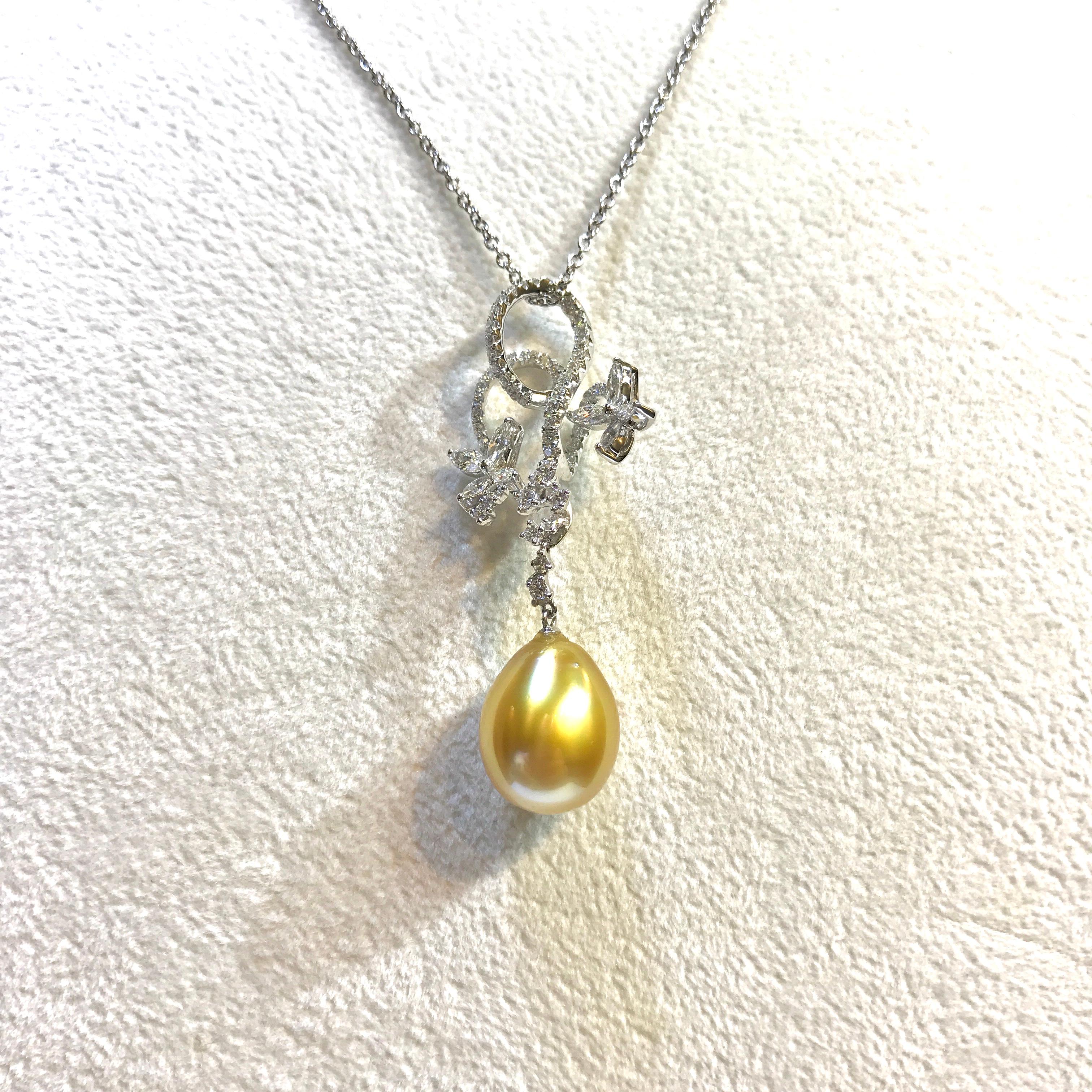 Elegant Golden drop South sea pearl diamond pendant whit 18kw, some marquise flower on the top of pendant , dancing like beautiful butterflies.

Height: 58.72 mm / Width: 14.52 mm / Depth: 5 mm
South Sea Pearl Size: W-12.1 mm x H-14.7 mm
Total