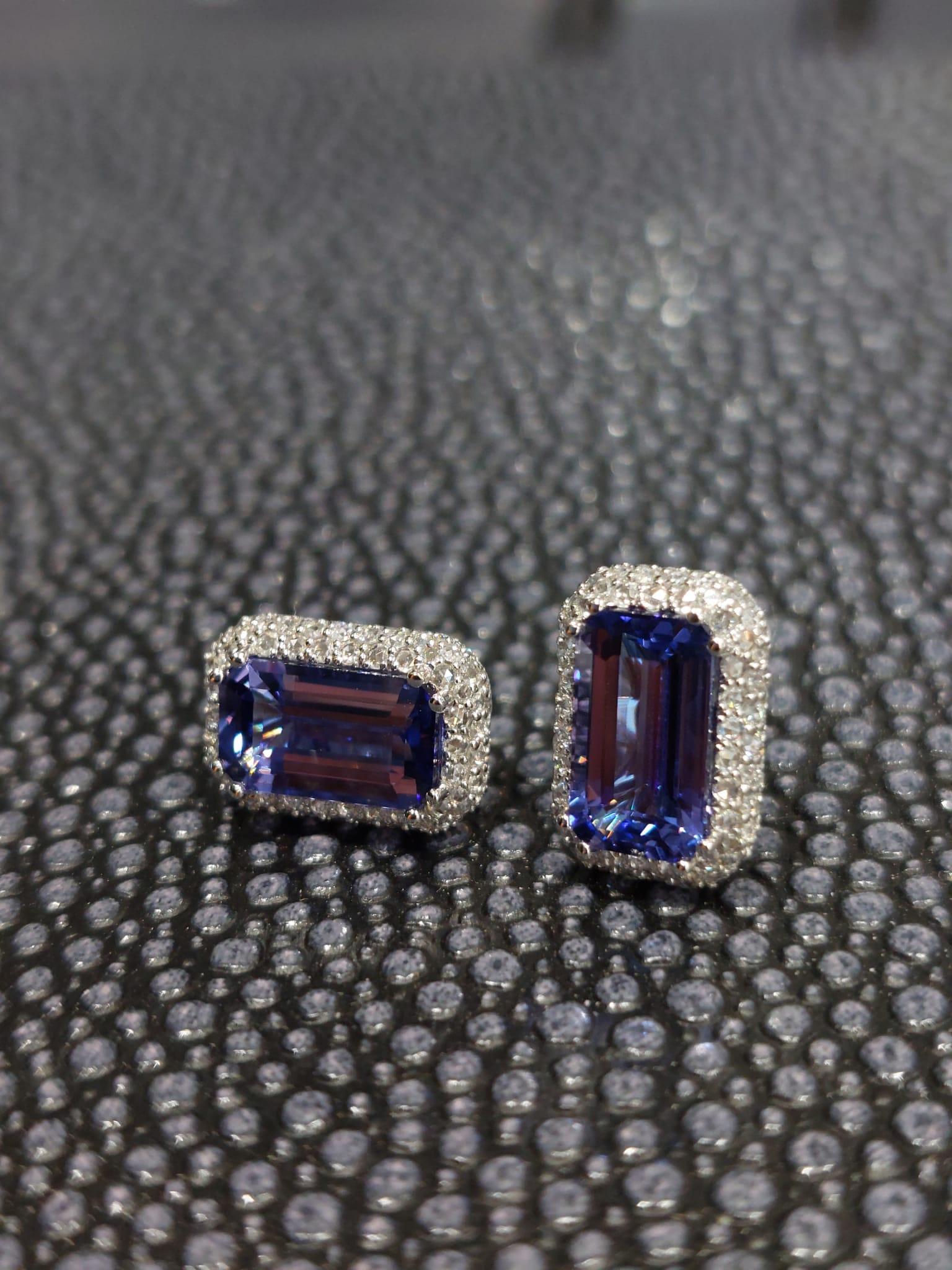 Tanzanite is a very rare gem known for its enigmatic and magical beauty, believed to possess transmutational abilities that can assist in transforming one's spirit.

The earring setting with center tanzanite total weight 3.38 carat, the diamond