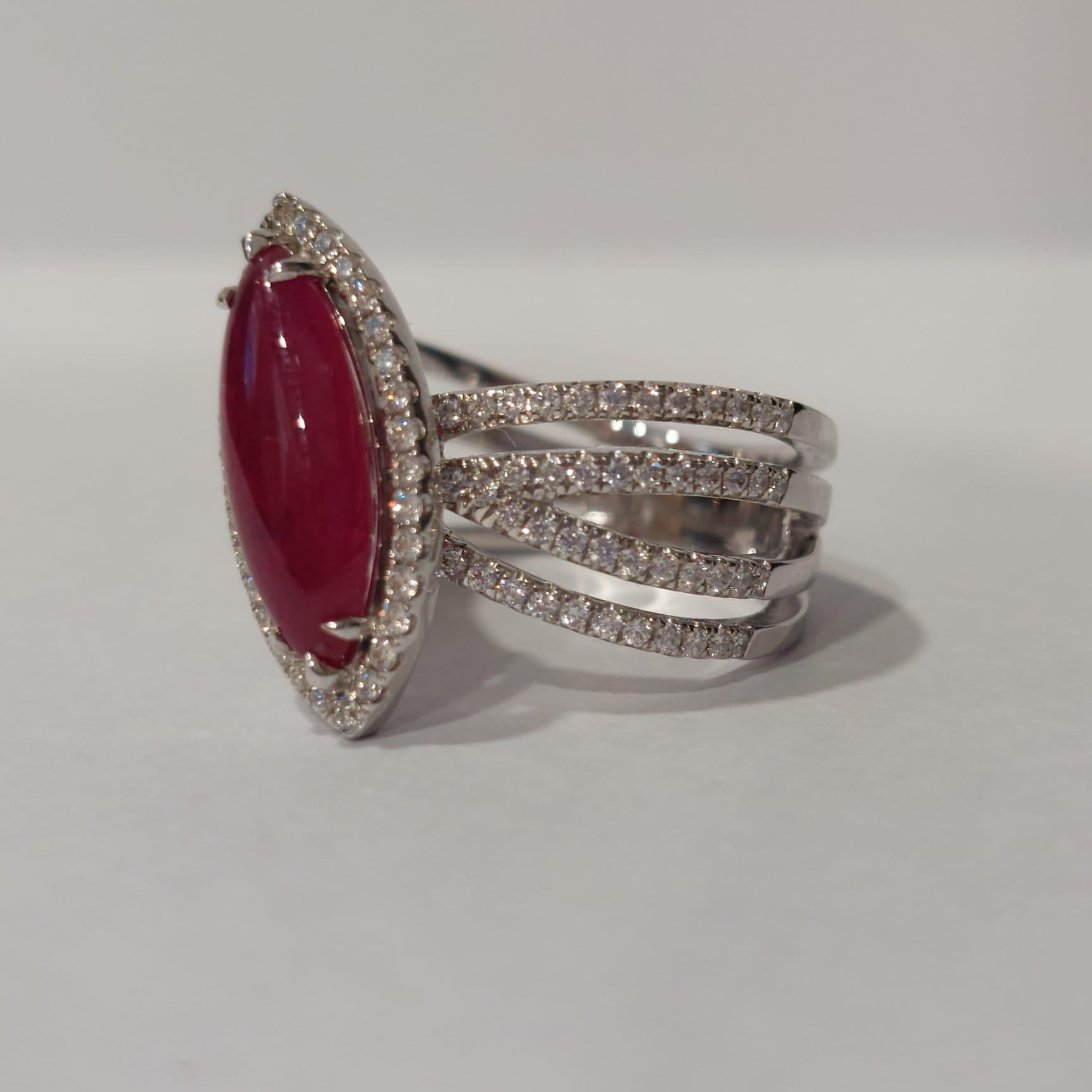 The ruby is known as a protective stone that can bring happiness and passion into the life of the wearer.

The center ruby weight is 2.76 carat, diamond total weight is 0.57 carat.
The ring made in 18K white gold and the ring size is US 6.5
