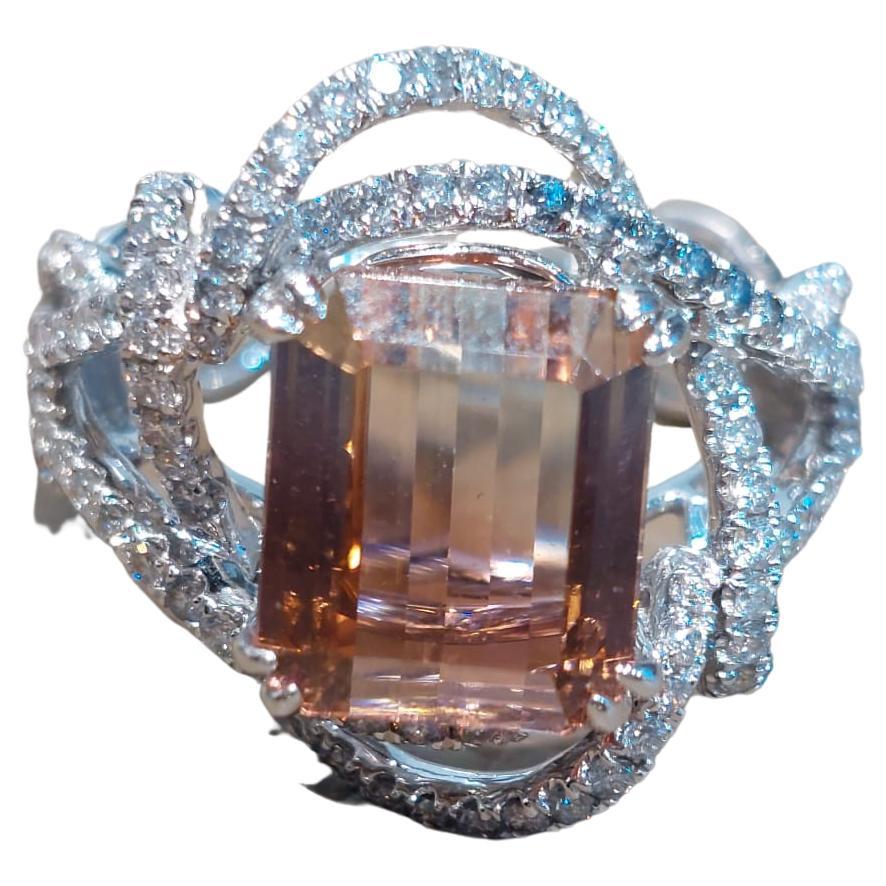 Tourmaline rumored to be born from the rare energy of a rainbow, Tourmaline many shades ripple with imaginative play, joyful generosity, and attracting perfect prosperity.

The center tourmaline weight 4.39 carat, the diamond totally is 148 pieces