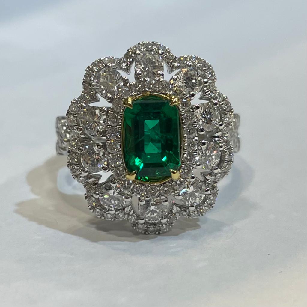 This emerald and diamond ring is 1.08 carats and the total diamond weight is 116 pieces 1.49 carats. This piece of jewelry is dazzling and can be matched with all outfits. Made in 18K white and yellow gold.