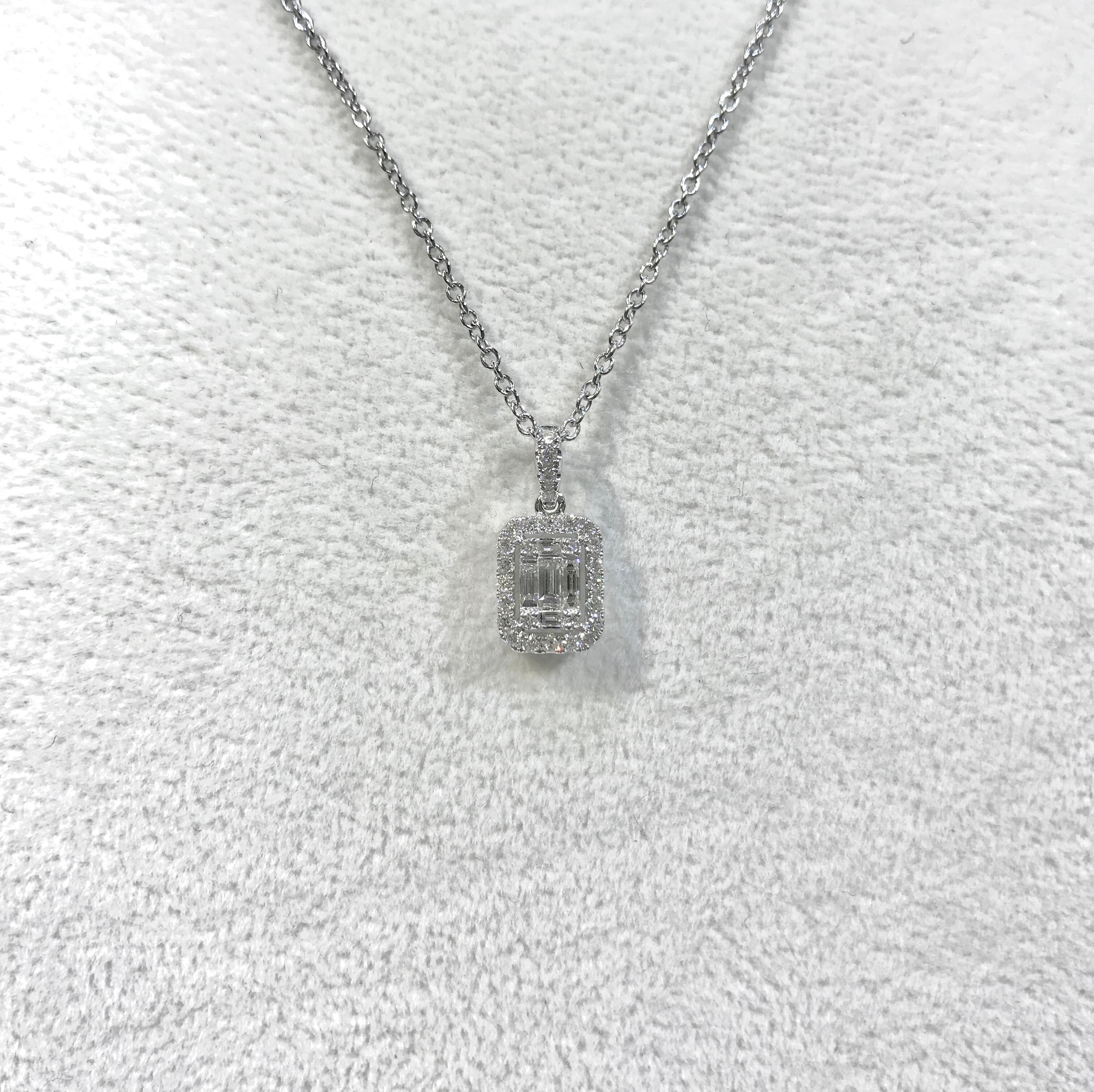 Clara collection- diamond pendant set with baguette illusion style, sparky and shine ! your daily wear best choice!

Height: 15.22 mm / Width: 7.53 mm / Depth: 3.28 mm / 18 Karat White Gold: 1.10 gm
Total Diamond Weight: 0.19 ct / White Diamond 4
