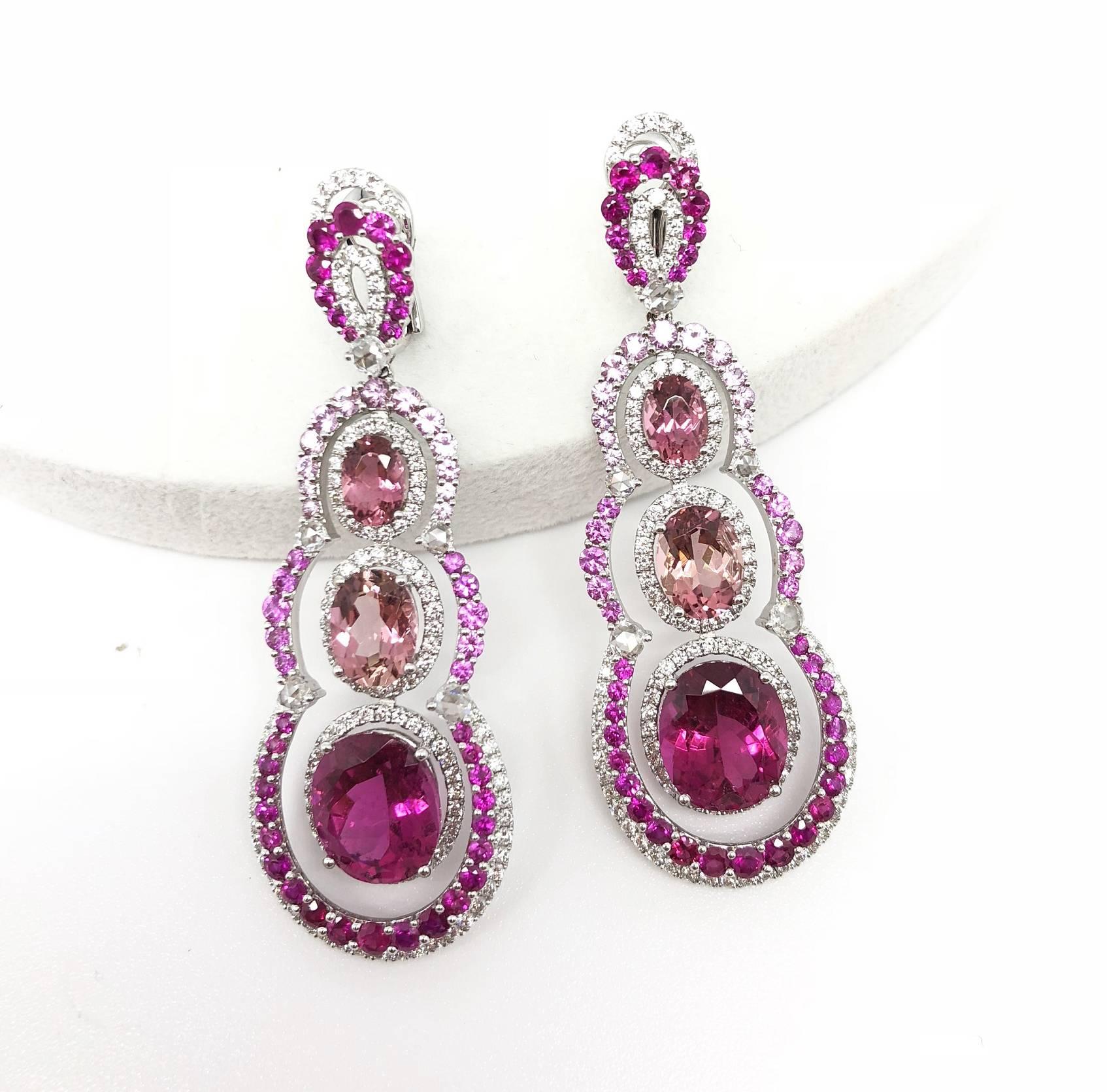 The Pinkish glamour will surely make you the most sparkling lady in the party. This stunning pair are made in 18 karat white gold with natural Rubelite, Tourmaline, Pink Sapphire and Diamonds.