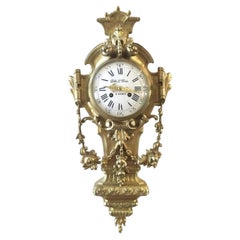 Gille L'Aîné (1690-1765) Orologio a cartello LOUIS XV in bronzo dorato e ormolu (1760 ca.)