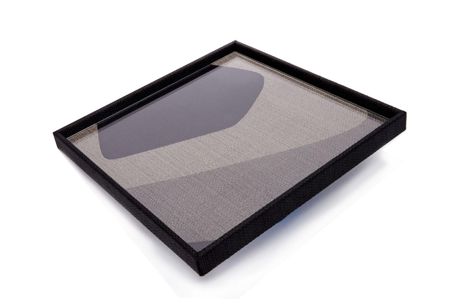 13” square geometric patch tray with glass top by Gilles Caffier

Tray patched of geometric pattern is made from cotton, polyester and has removable glass.

Renowned for his unique & limited edition pieces, Gilles Caffier creates topical