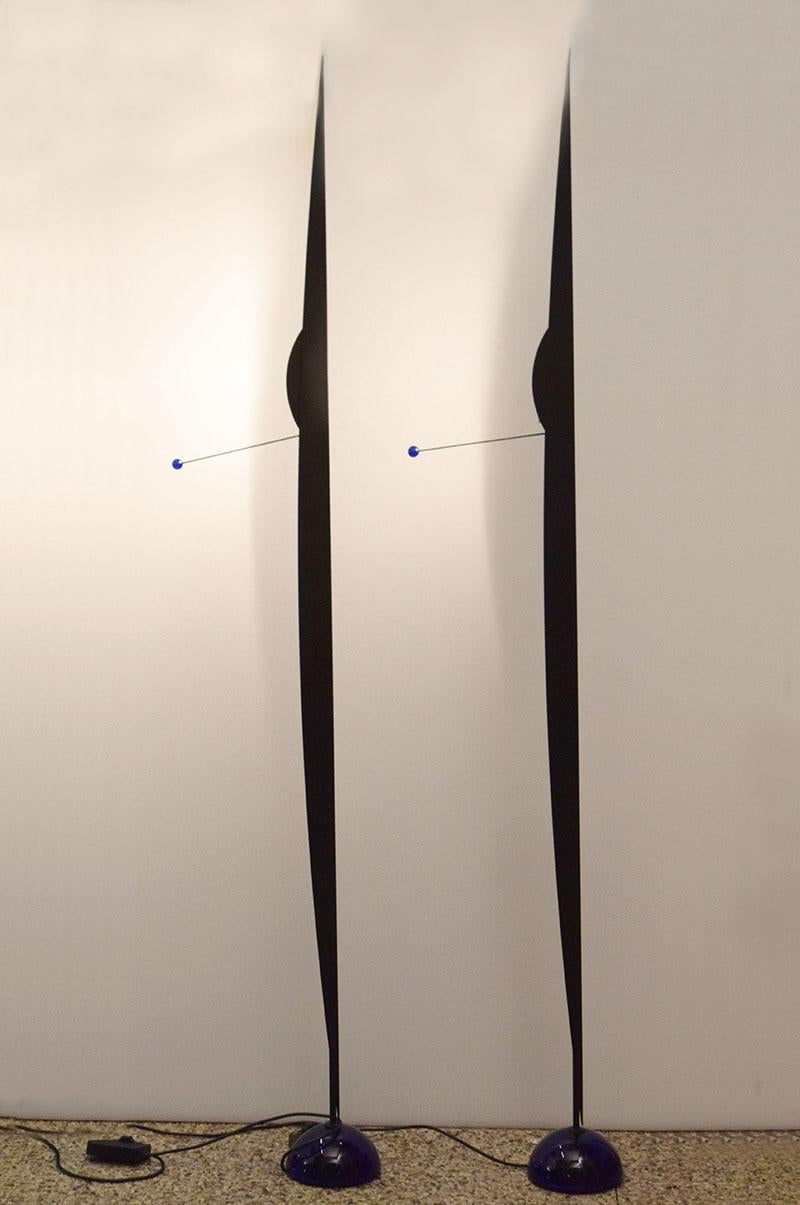 Rare Floor lamps model Flame design Gilles Derain for Lumen 1980s. Matt black painted steel frame with distinctive blade shape, halogen light adjustable in intensity. Base and ball in blue murano glass. In excellent condition.