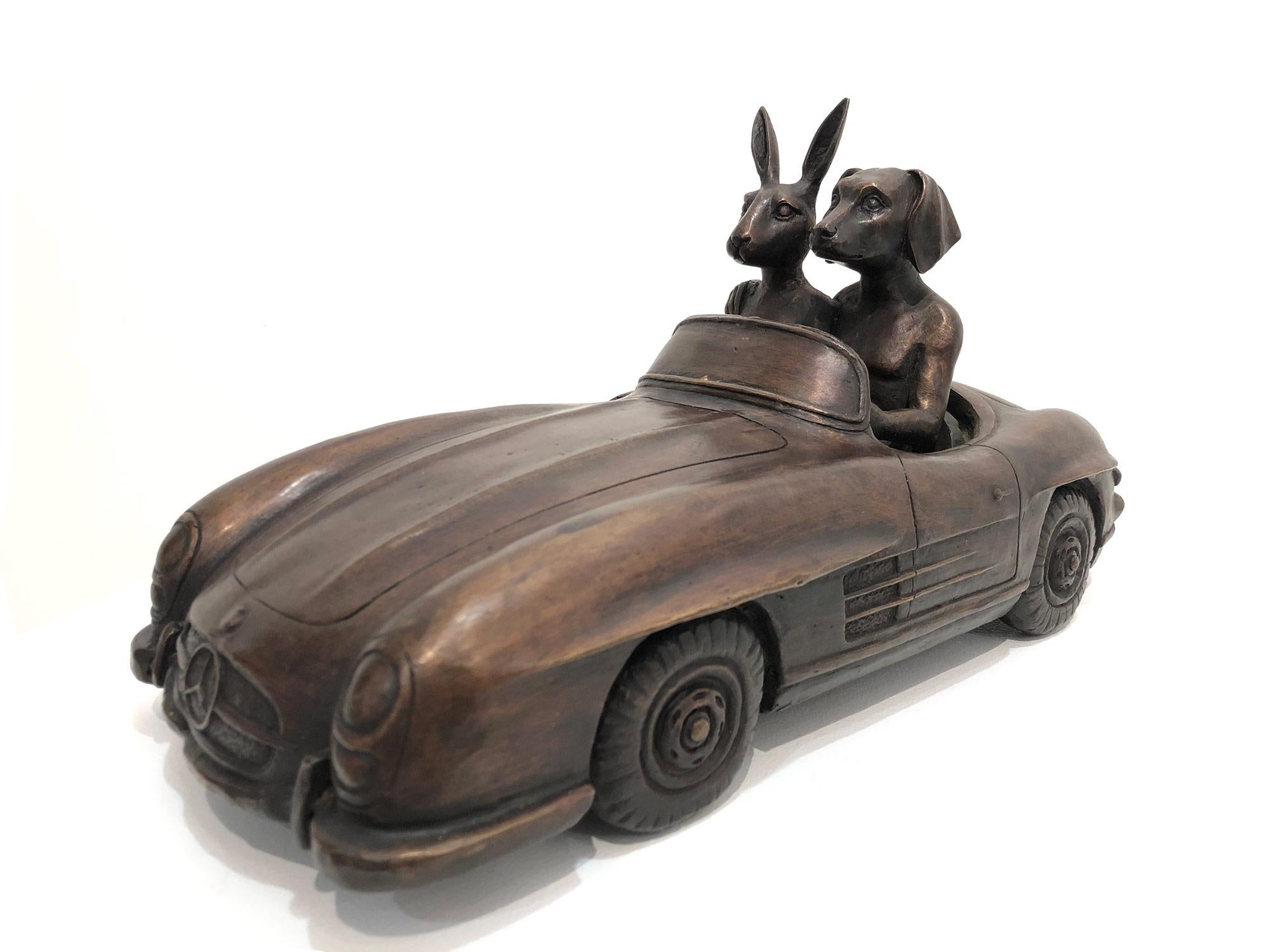 Gillie and Marc Schattner Figurative Sculpture - A Merc is a Rabbit and Dogs' Best Friend