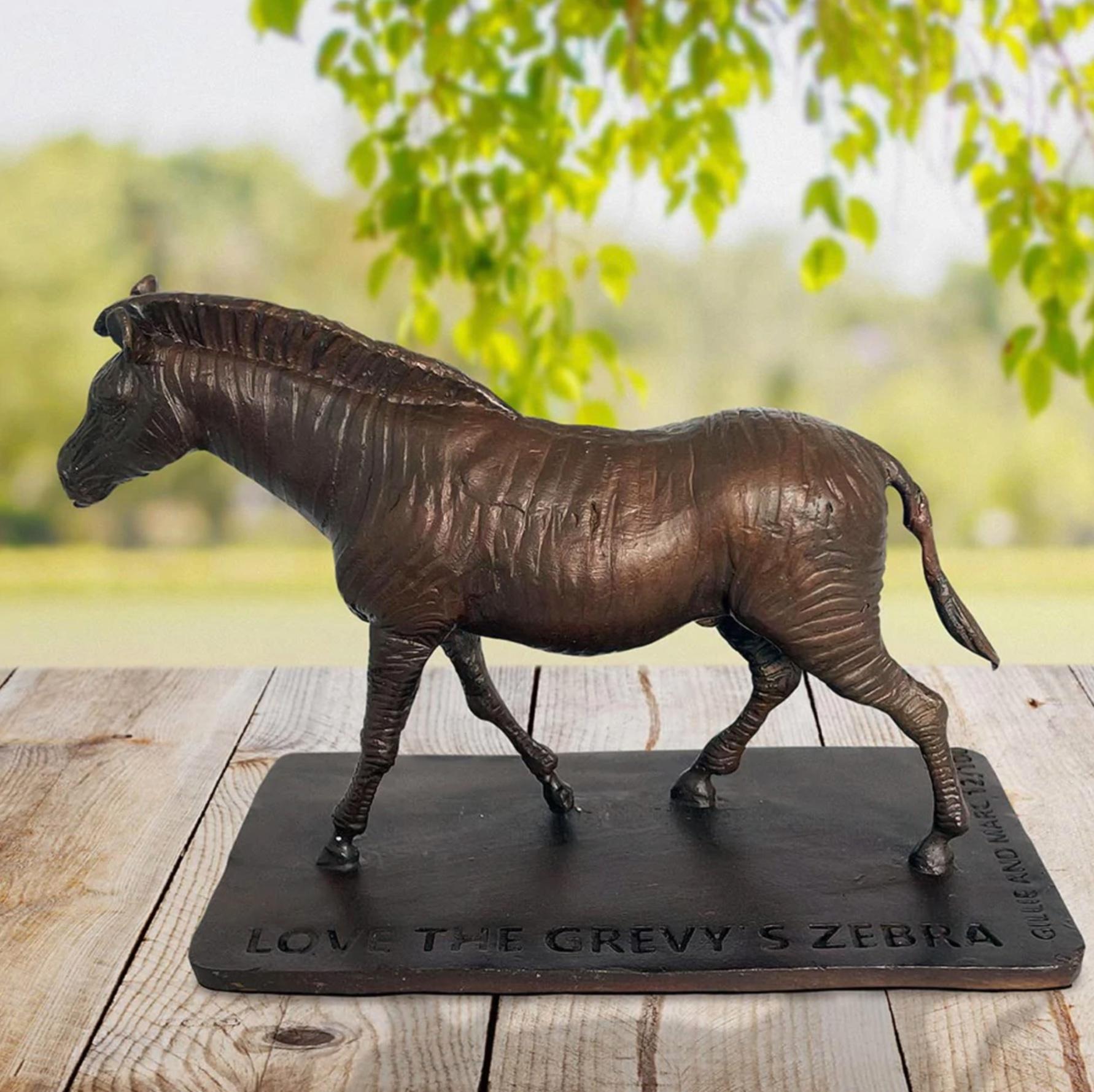 Title: Love the Grevy's Zebra
Authentic Bronze Sculpture

This authentic bronze sculpture titled 'Love the Grevy's Zebra' by artists Gillie and Marc has been meticulously crafted in bronze. It features the Grevy's Zebra marching and comes in a