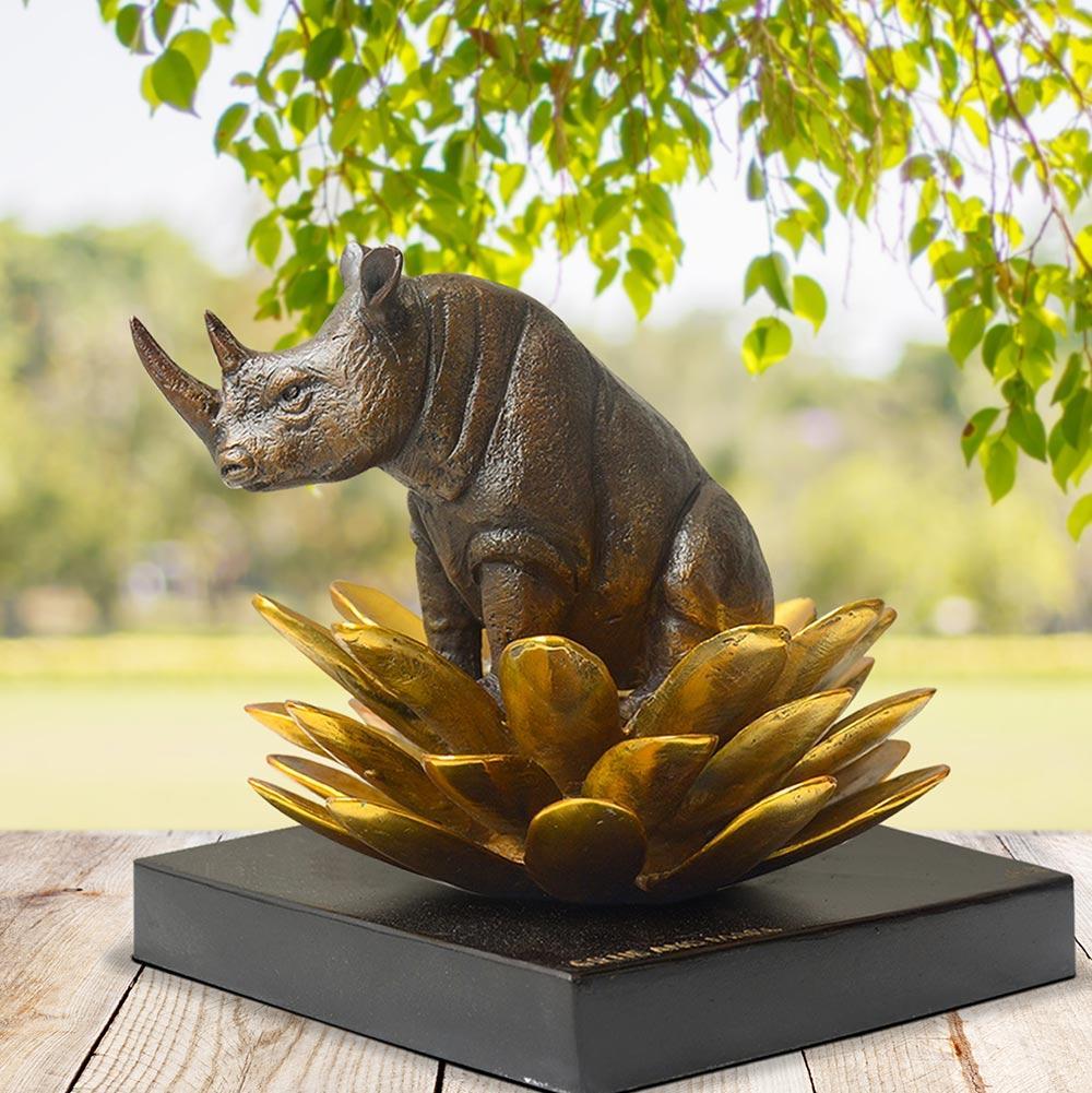 Authentic Bronze The rhino was in golden bloom sculpture by Gillie and Marc - Sculpture by Gillie and Marc Schattner