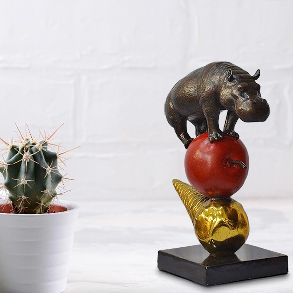 Title: The Hippo just wanted an apple and ice cream
Authentic bronze sculpture with gold and red patina
Limited Edition

World Famous Contemporary Artists: Husband and wife team, Gillie and Marc, are New York and Sydney-based contemporary artists