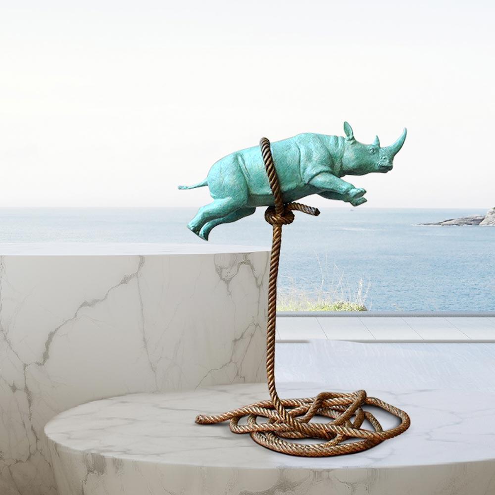 Gillie and Marc Schattner Figurative Sculpture - Bronze Animal Sculpture - Limited Edition - Flying Green Rhino on Rope - Art