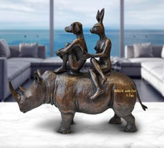 Authentic Bronze Spent their lives saving rhinos sculpture by Gillie and Marc