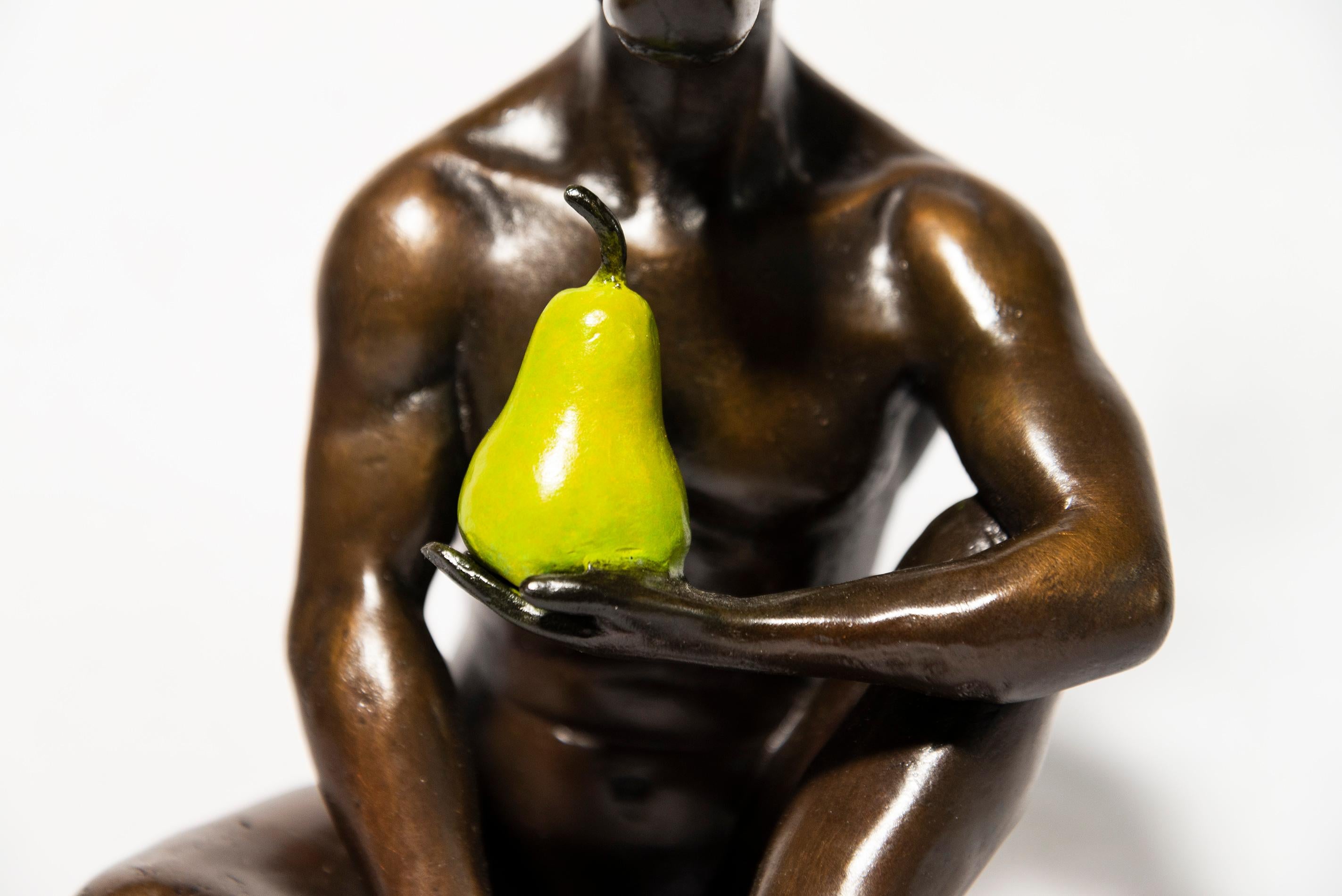 Clutching a pear, an ancient symbol of abundance, longevity and fertility, a deer man…half animal, half human is one of a new series of tabletop sculptures by Gillie and Marc. Cast in bronze, the handsome deer man is seated, legs crossed, a bright