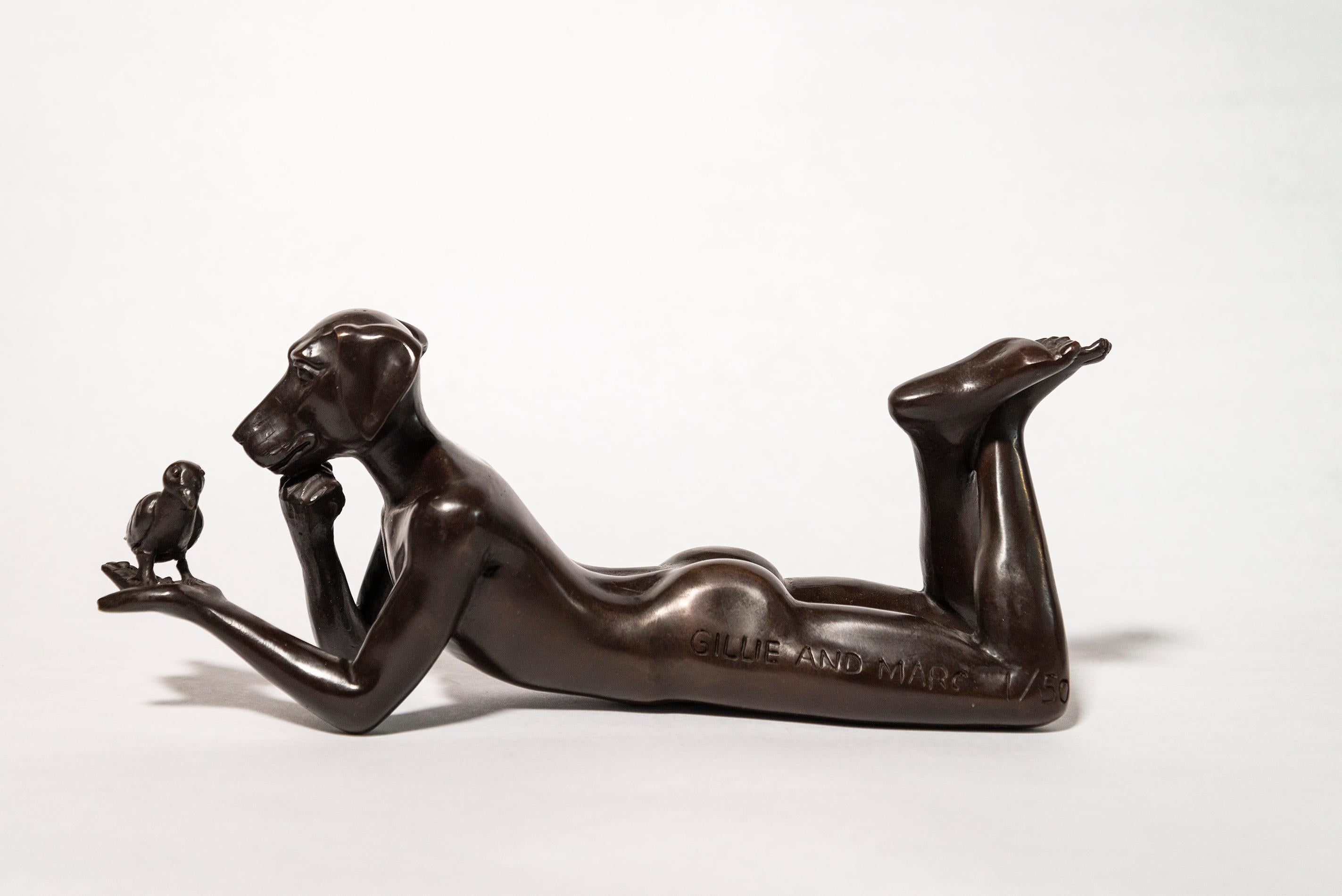 Dogman thought a bird in the hand is always better 1/50 - bronze sculpture - Sculpture by Gillie and Marc Schattner
