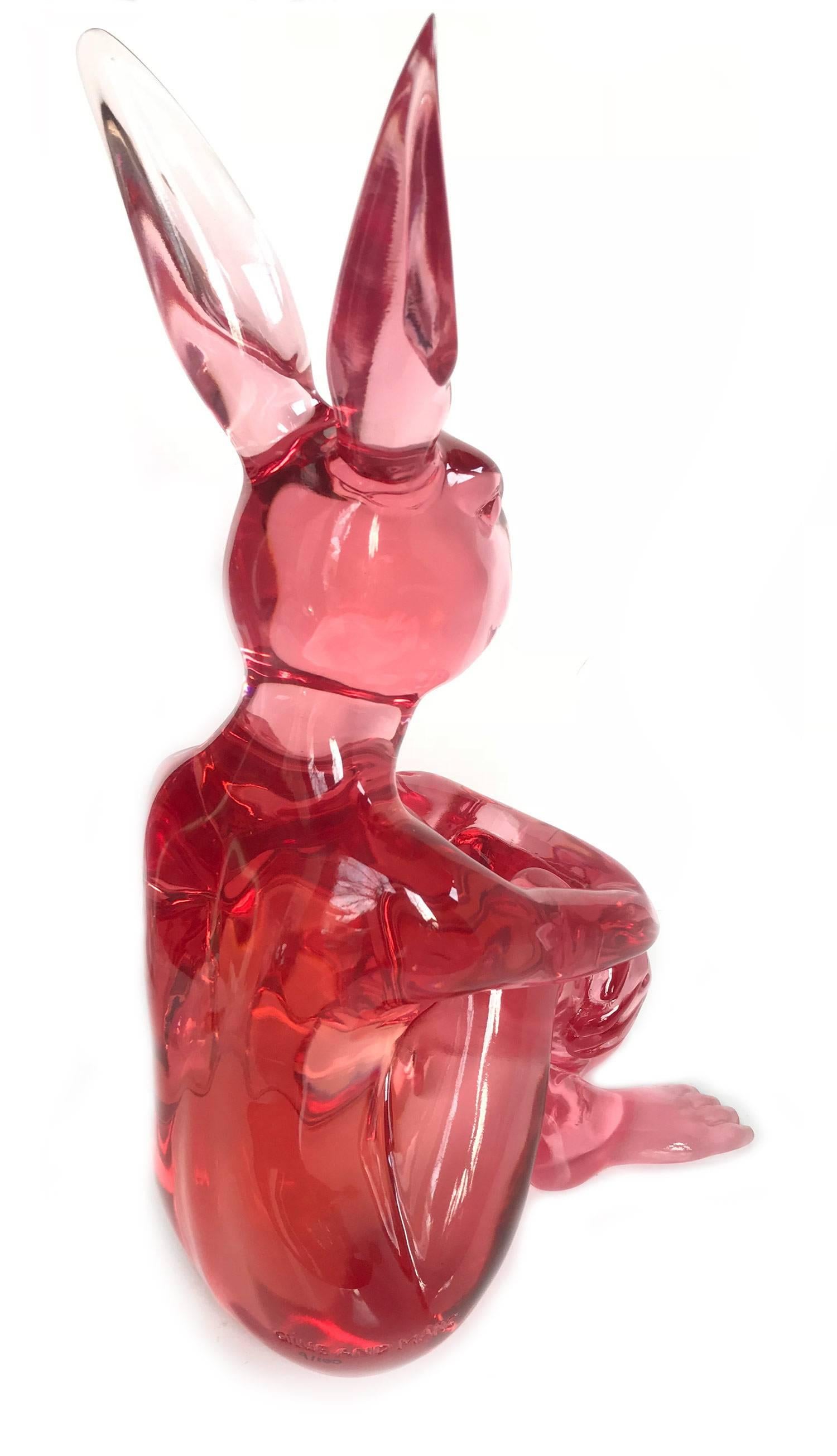 A whimsical yet very strong piece depicting the Dog Man from Gillie and Marc's iconic figures of the Dog/Bunny Human Hybrid, which has picked up much esteem across the globe. Here we find Rabbitgirl sitting crossed legged in a bright and fun Pink