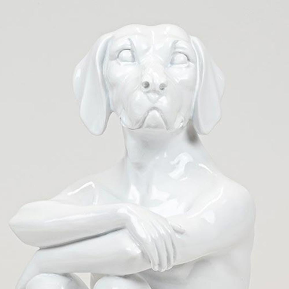 Title: Cool City Pup
Authentic resin sculpture in White

Description:
This authentic resin sculpture titled 'Cool City Pup' by artists Gillie and Marc has been meticulously crafted in resin. It features a Gillie and Marcs famous dog man in pup form