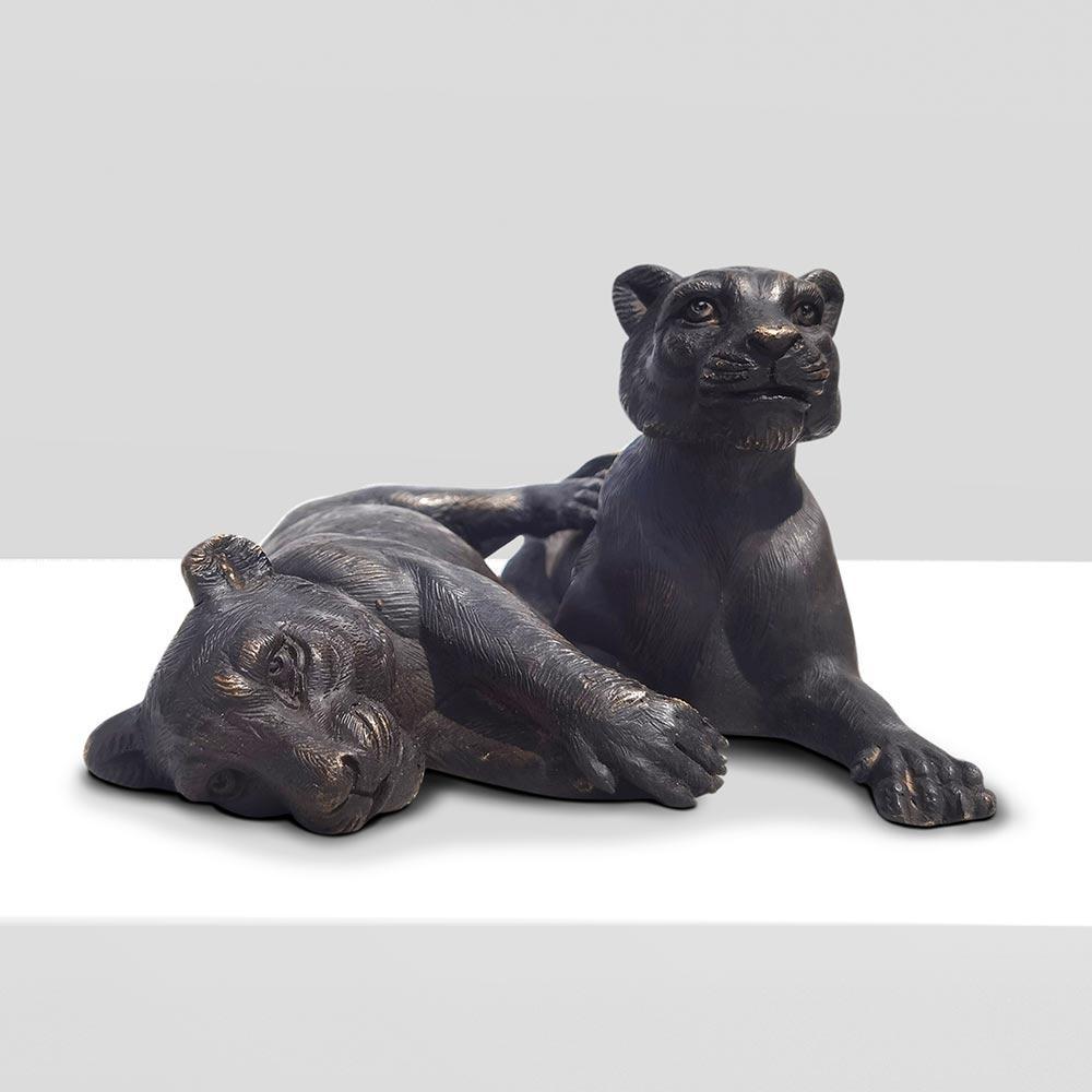 Title: The Cubs Were Best Friends
Authentic bronze sculpture

This authentic bronze sculpture titled 'The Cubs Were Best Friends' by artists Gillie and Marc has been meticulously crafted in bronze. It features two cubs hanging out together and comes